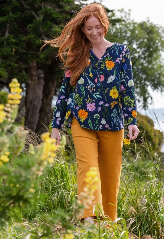 024-woman-walking-through-flowers-lifestyle-photography.jpg