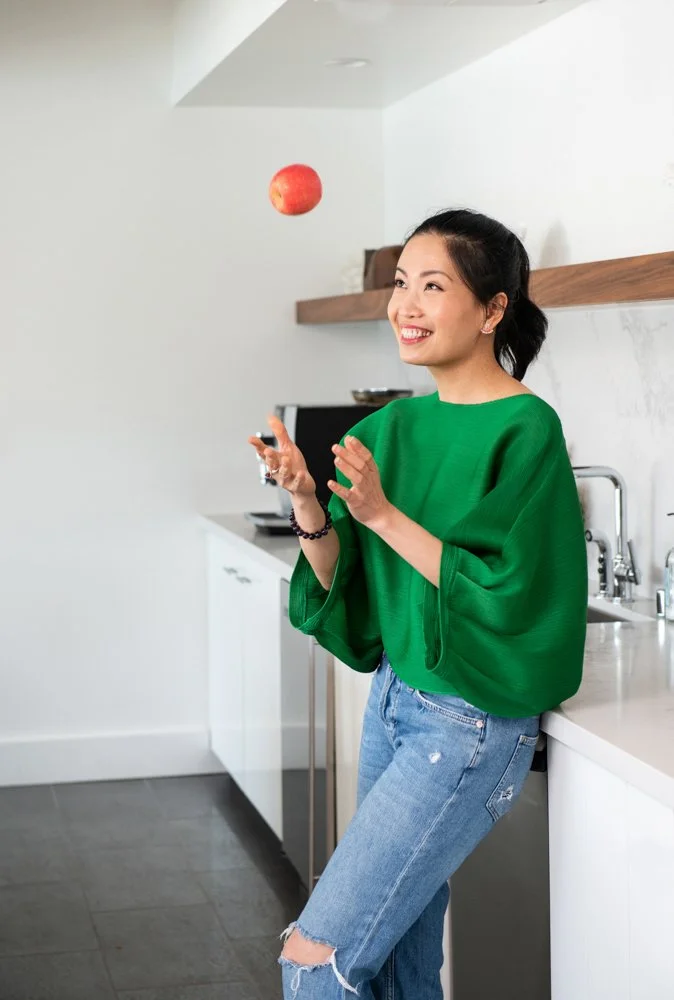 038-woman-tossing-up-apple-lifestyle-portraits.jpg