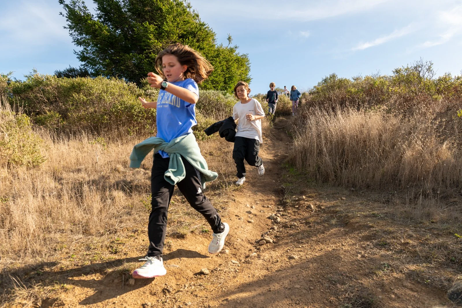 008-children-running-uphill-outdoor-classroom-shots.jpg