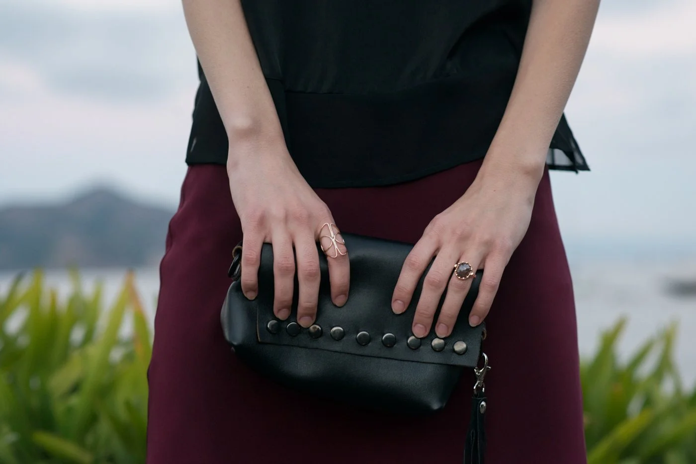 007-woman-holding-black-clutch-high-end-product-images.jpg