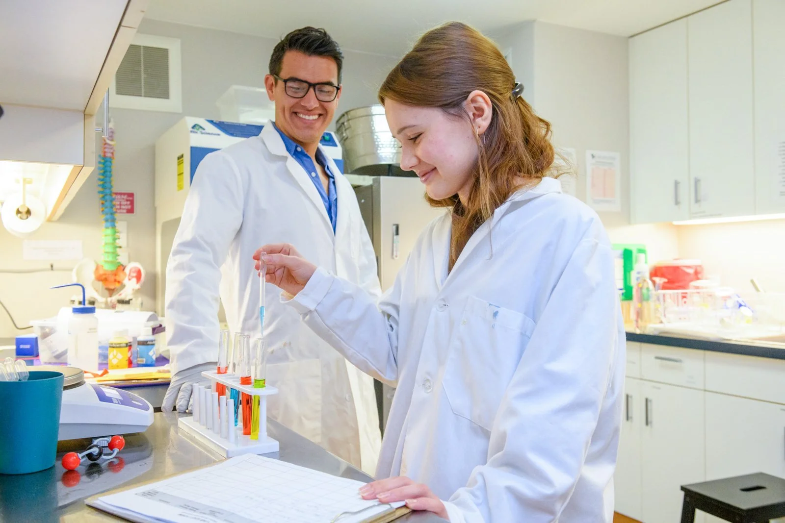 041-student-scientist-working-with-teacher-photography.jpg
