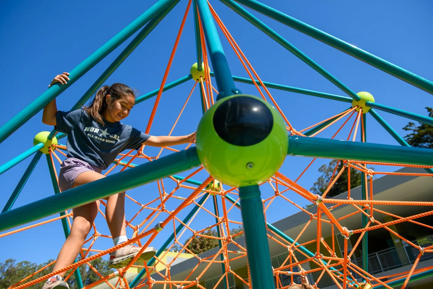 046-girl-climbing-playground-school-photographer.jpg