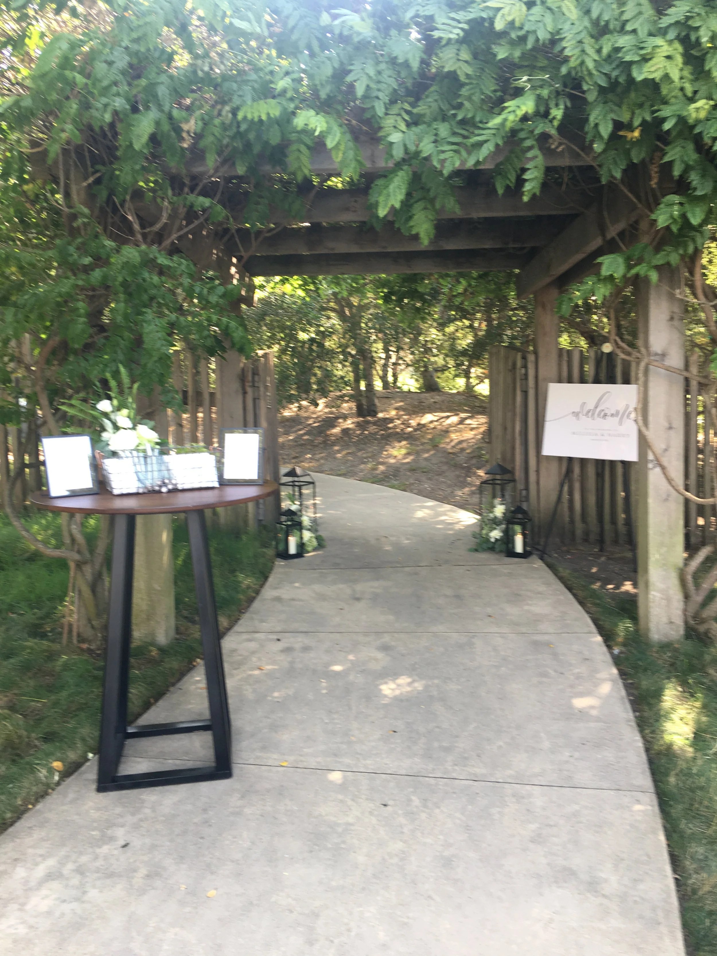 vineyard ceremony are entry walnut table. and malta lantern clusters.JPG