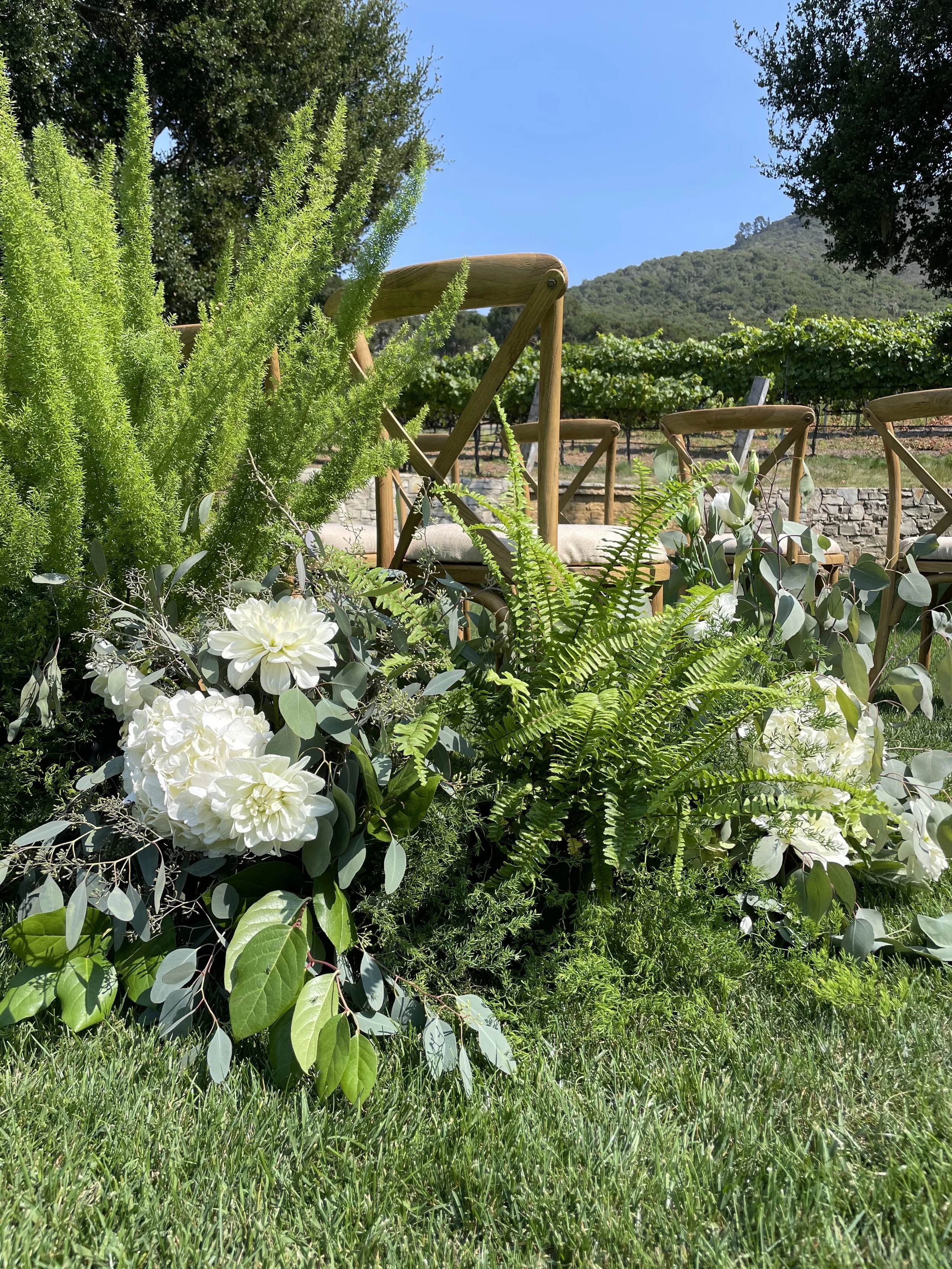 wedding aisle decor plants flowers.jpg