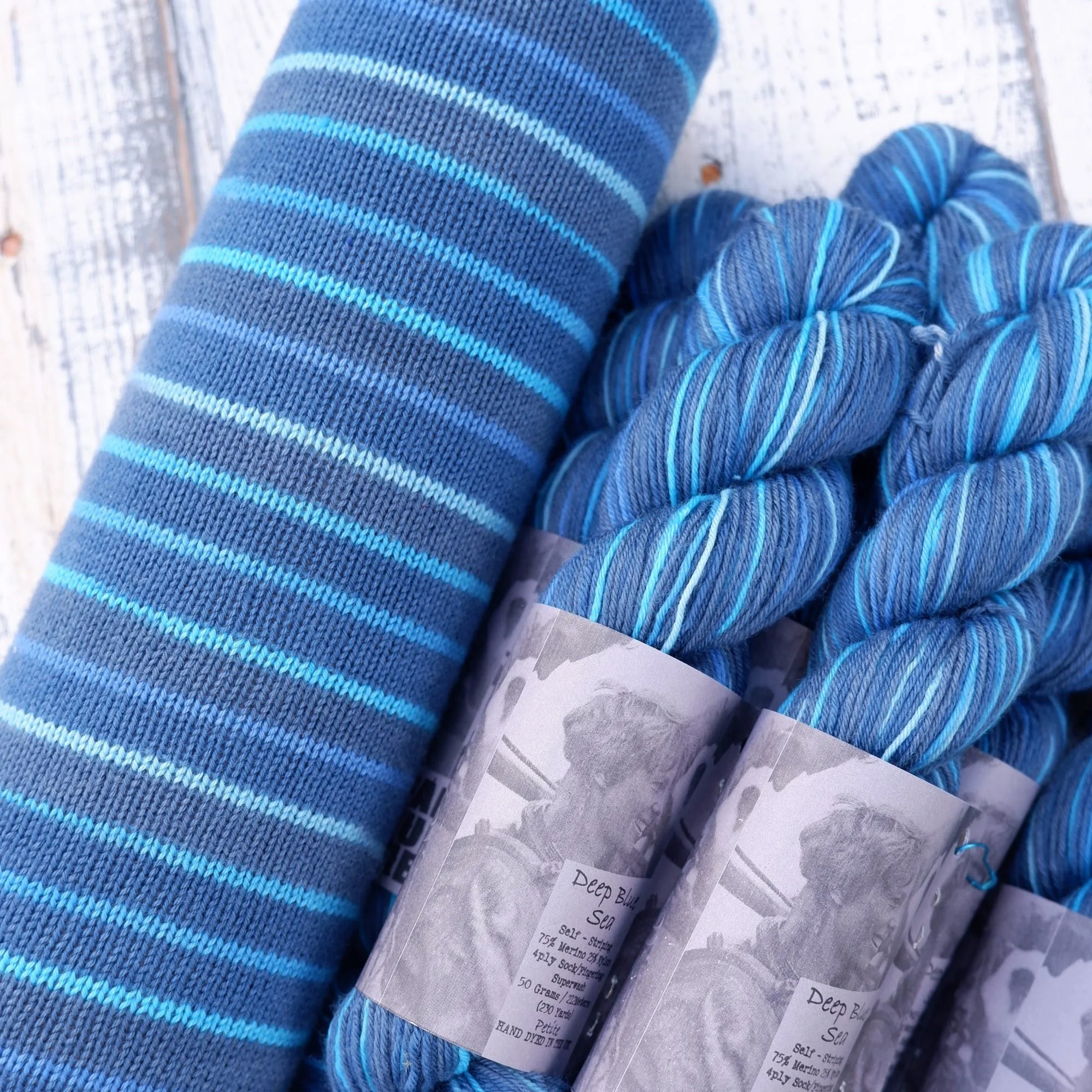 10 stripe hand dyed self-striping yarnFab Funky Fibres. Petite stripes of cool blues separated by a wide navy stripe