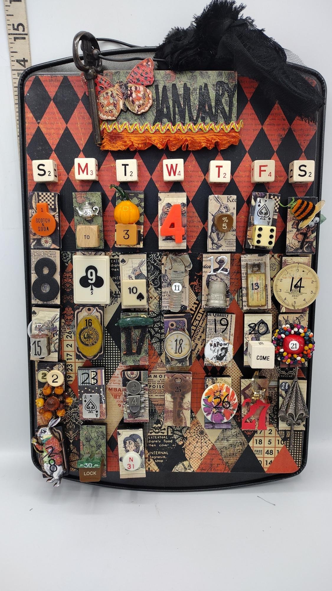 Wall calendar Alice black orange full front.jpg