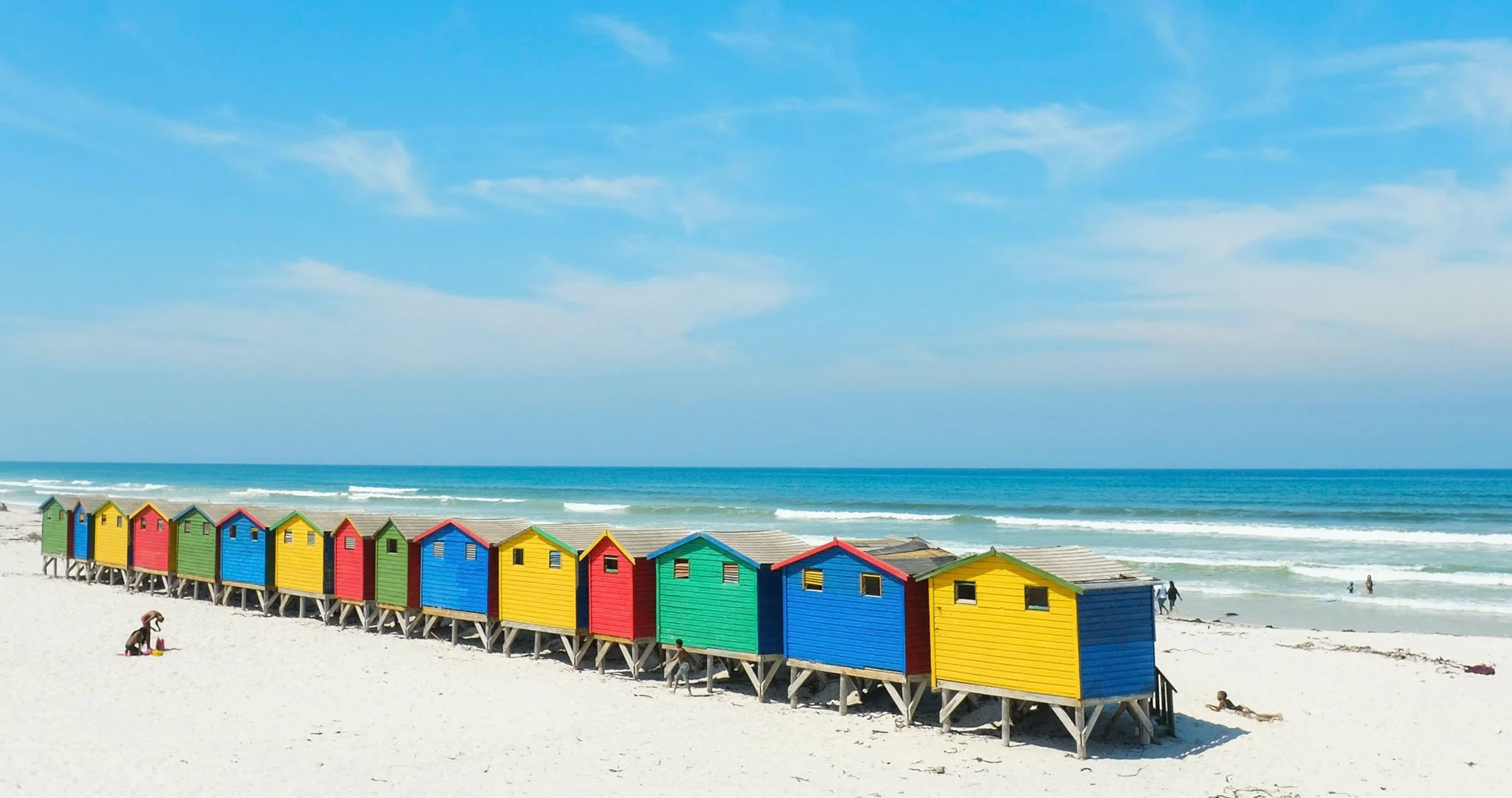 Muizenberg Beach, Cape Town. Famous colourful beach huts. Best beaches to visit in South Africa.