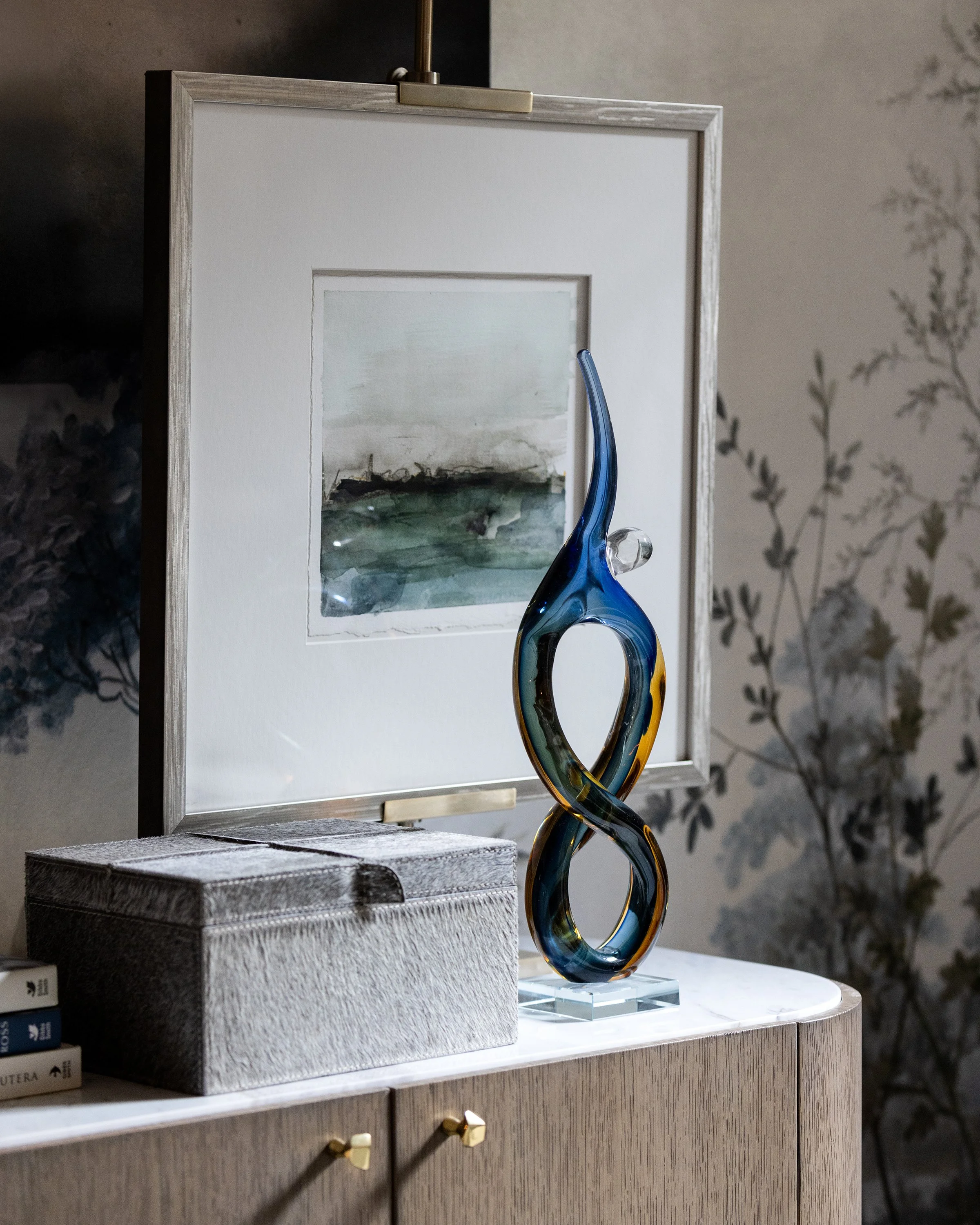 Detail of watercolor and sculpture in sitting area