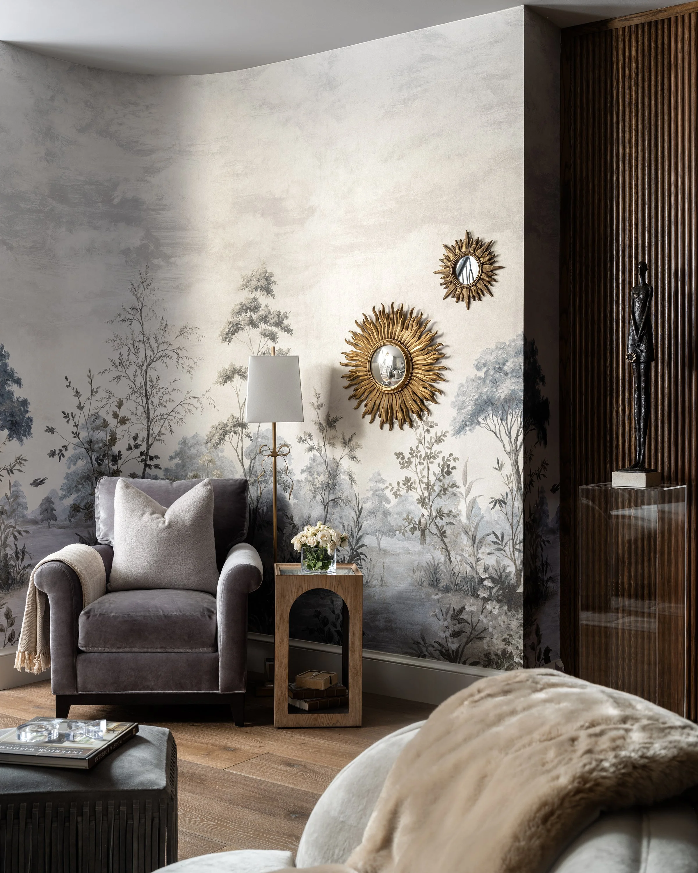 Corner chair with mural wallpaper