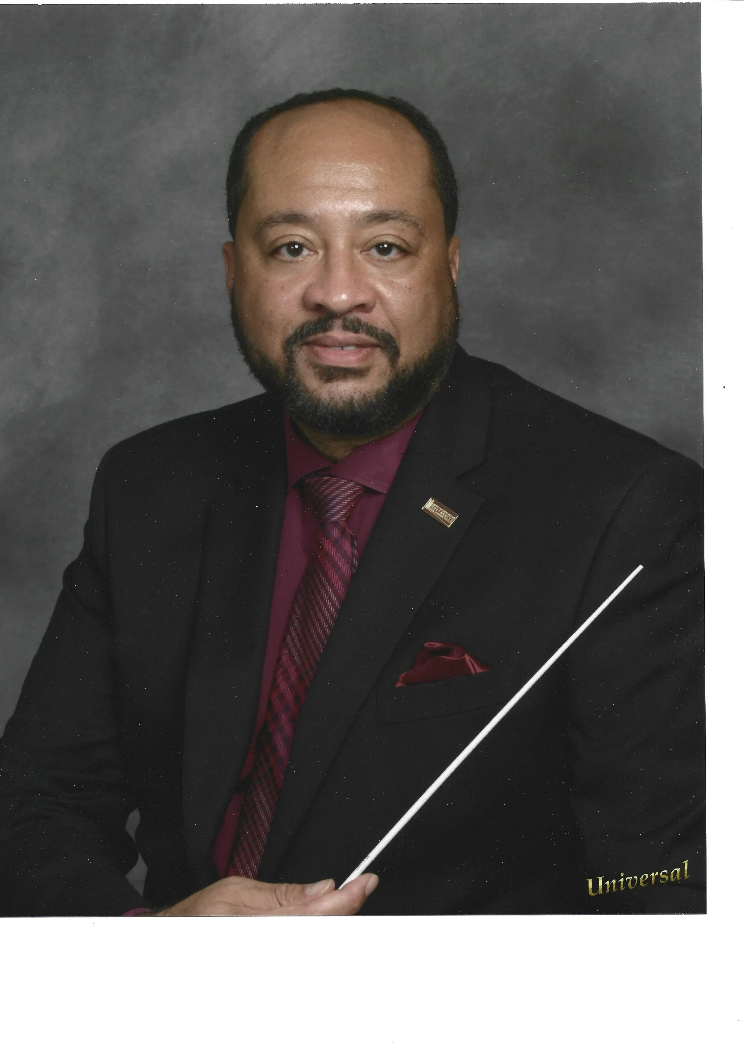 Dr. Marcus J. Rhodes