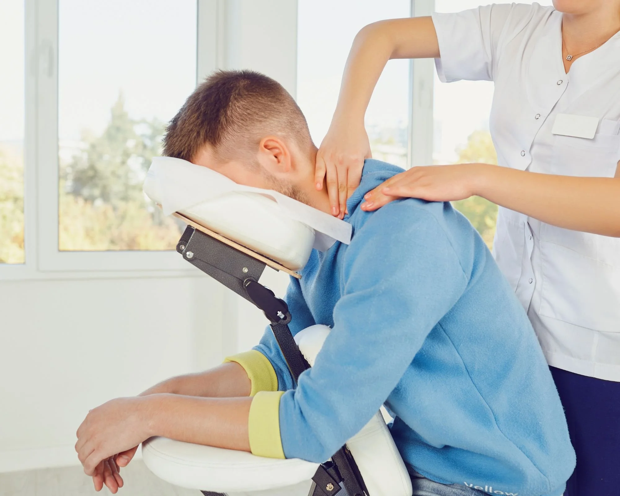 Person Getting Chair Message Top 5 Benefits of Chair Massage | New Life Foot and Body Spa