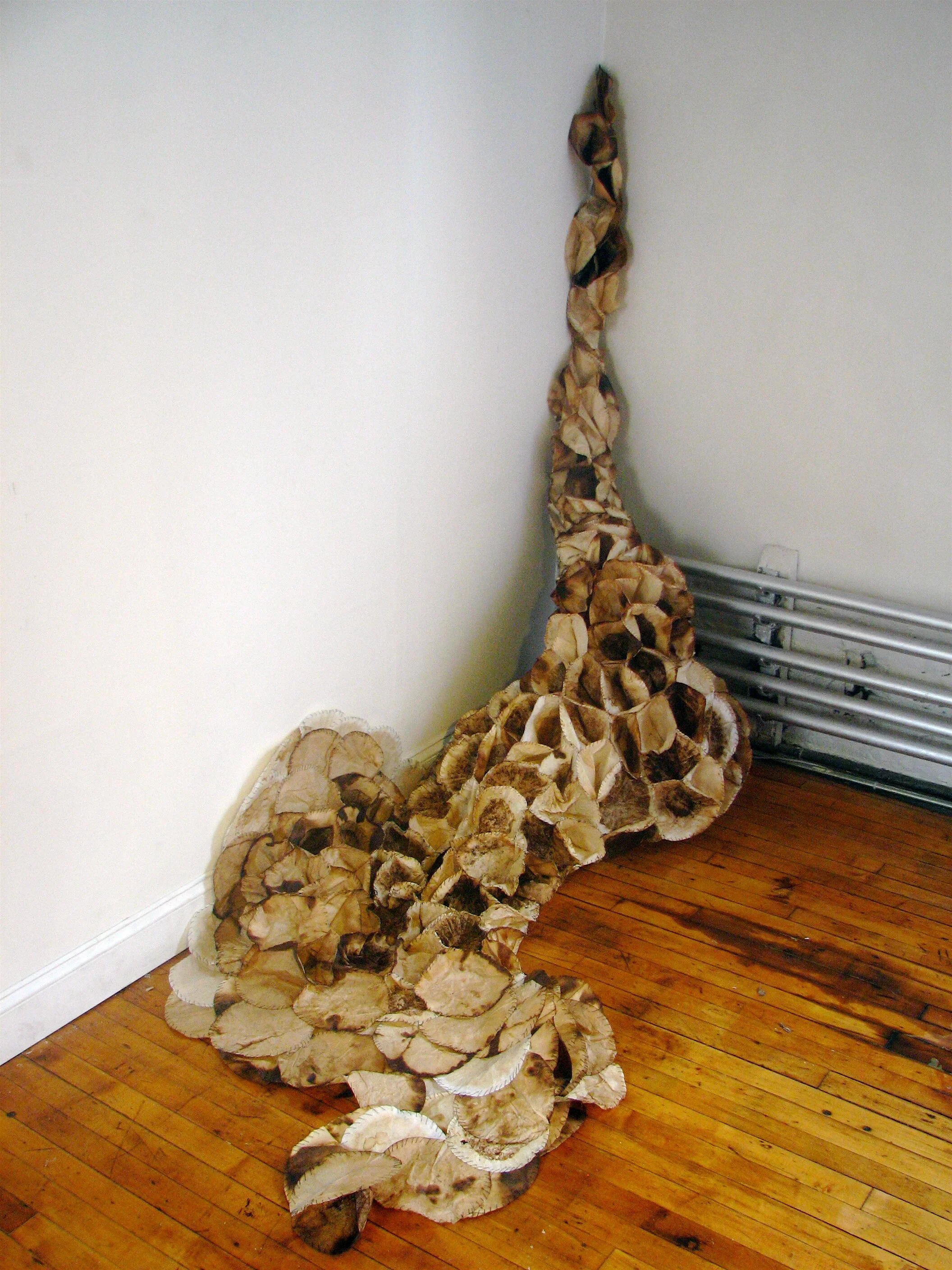 "Underflow," used coffee filters, wax, thread