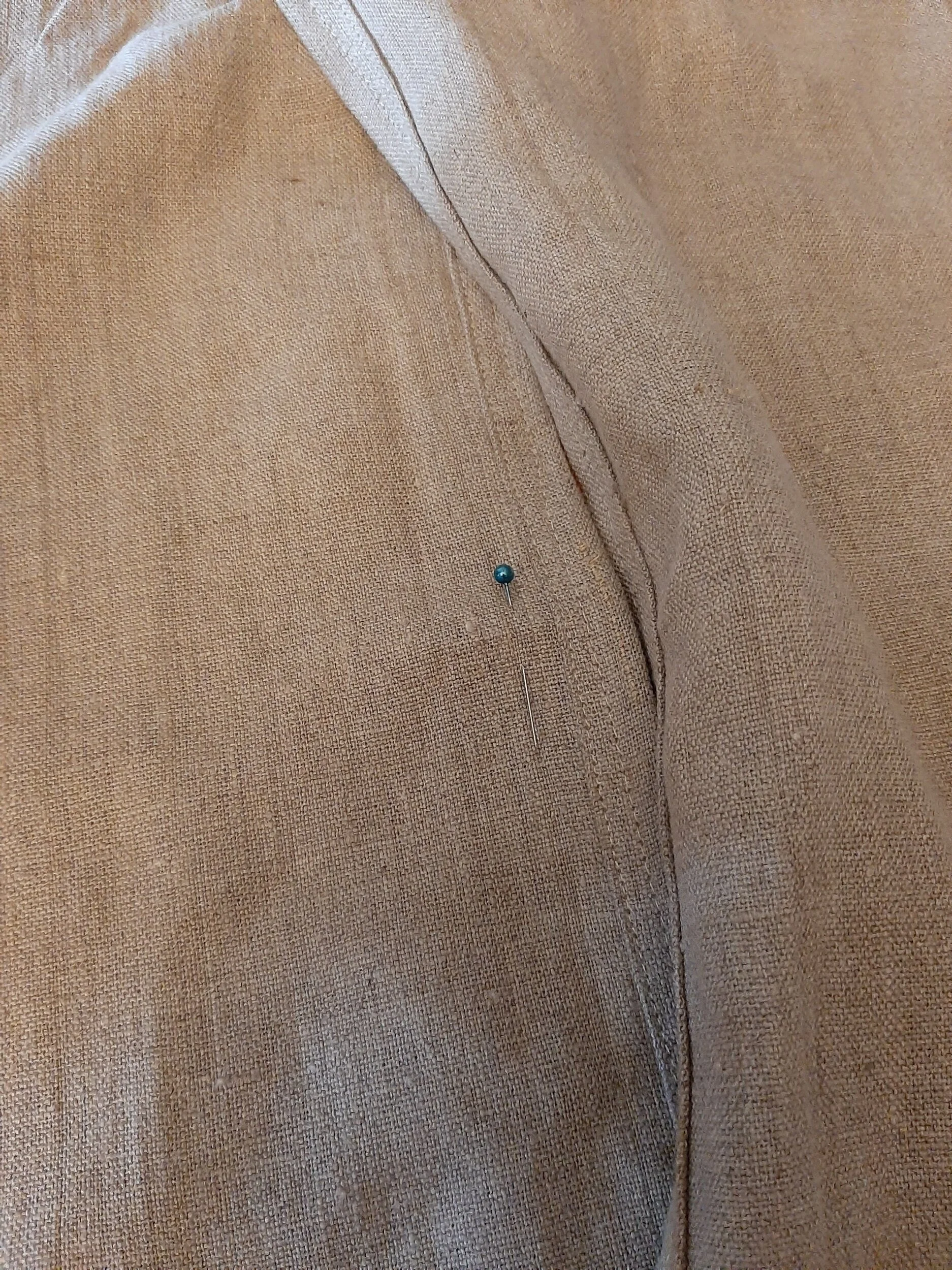 pin marking the middle of the back 