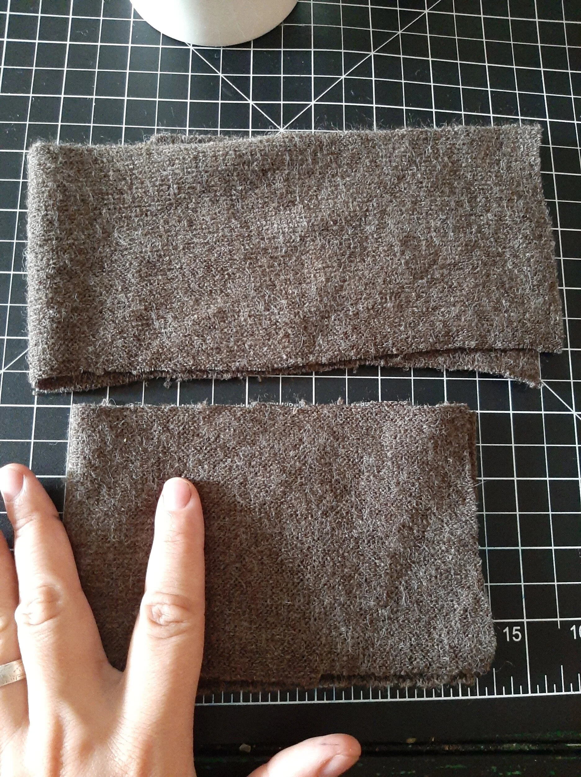 Neck pieces cut with stretch going lengthwise, so grain went widthwise 