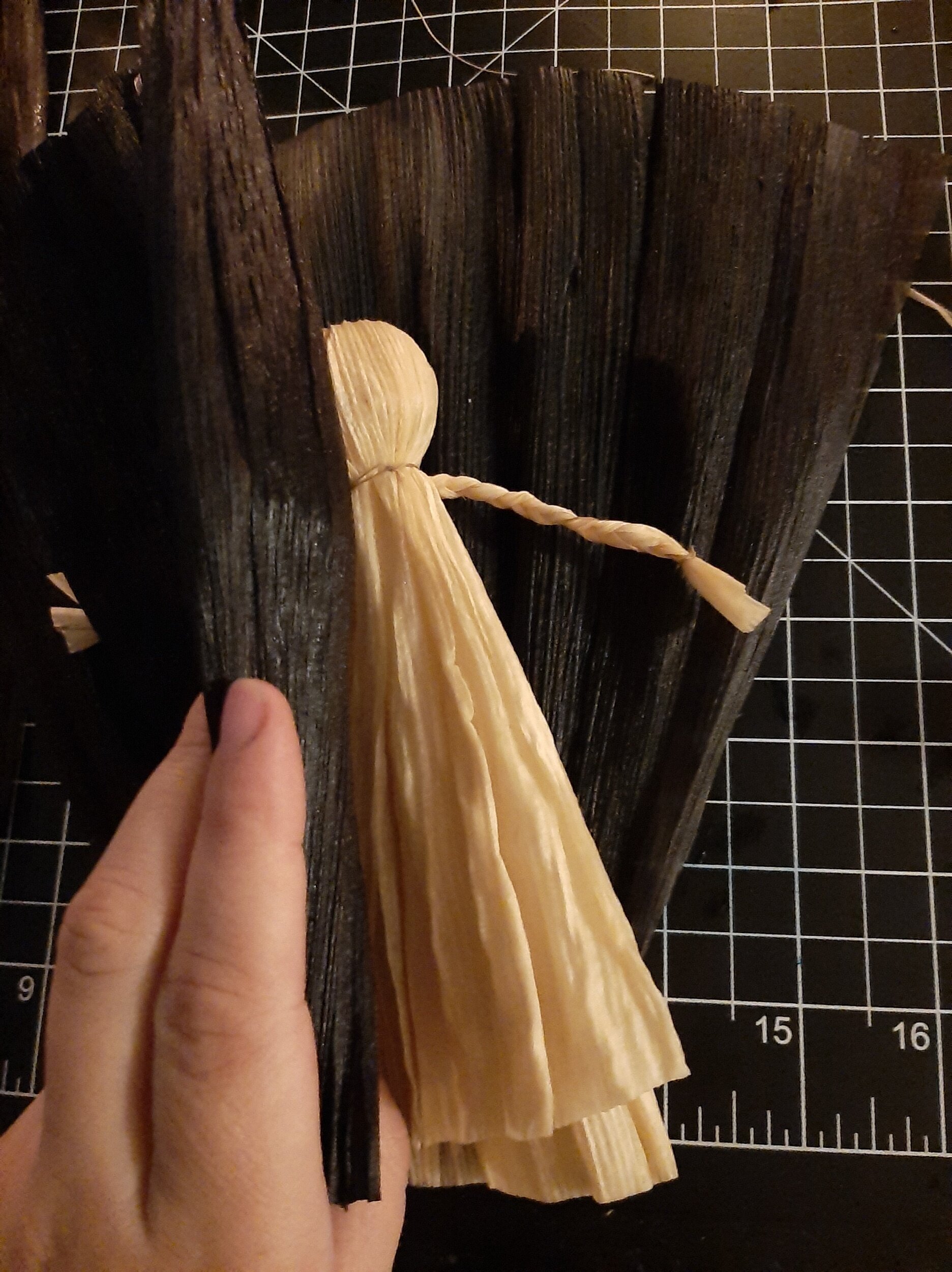 Placing my black husks top lined up with the bottom of my doll