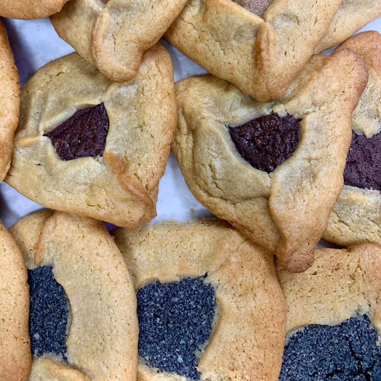 Have you preordered your hamantaschen yet?! We will have boxes of 8 assorted flavors available for pickup all weekend through next Tuesday, and singles are available daily - poppy, raspberry, apricot, and chocolate! Which flavor is your favorite?

Or
