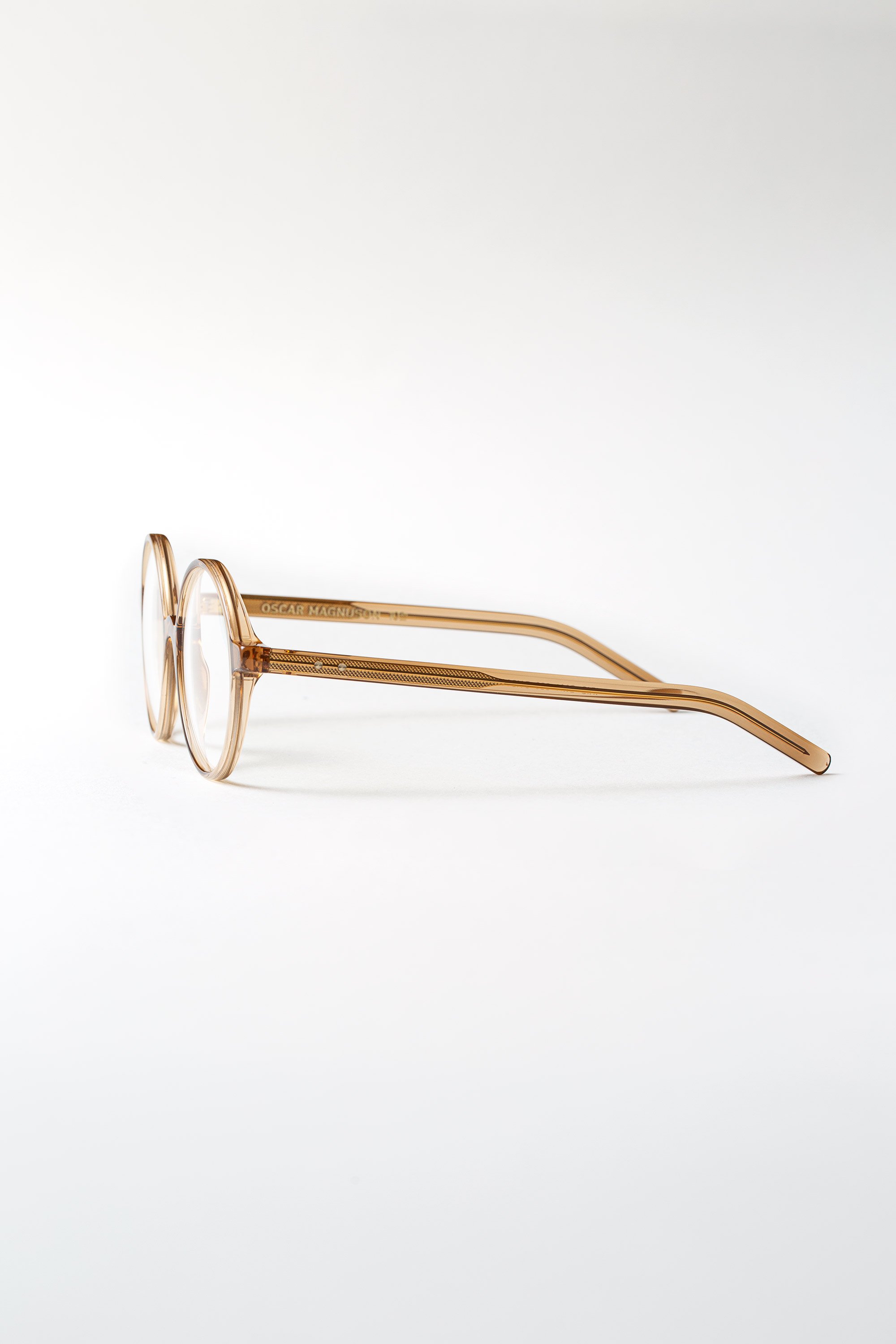 iris-10th-eyeglasses-2105-crystal-caramel-brown-2-sideview.jpg