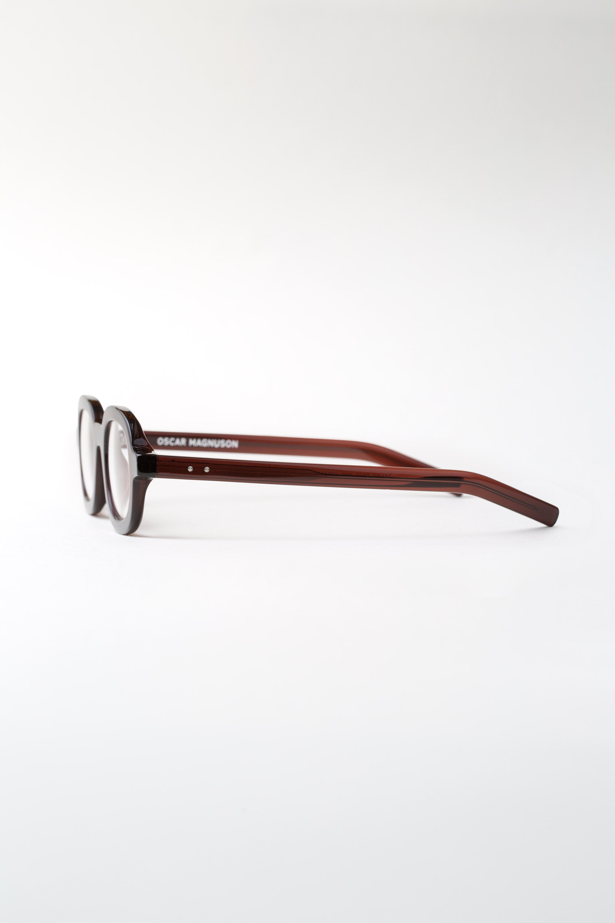 marc-om2-eyeglasses-600-dark-red-2-sideview.jpg