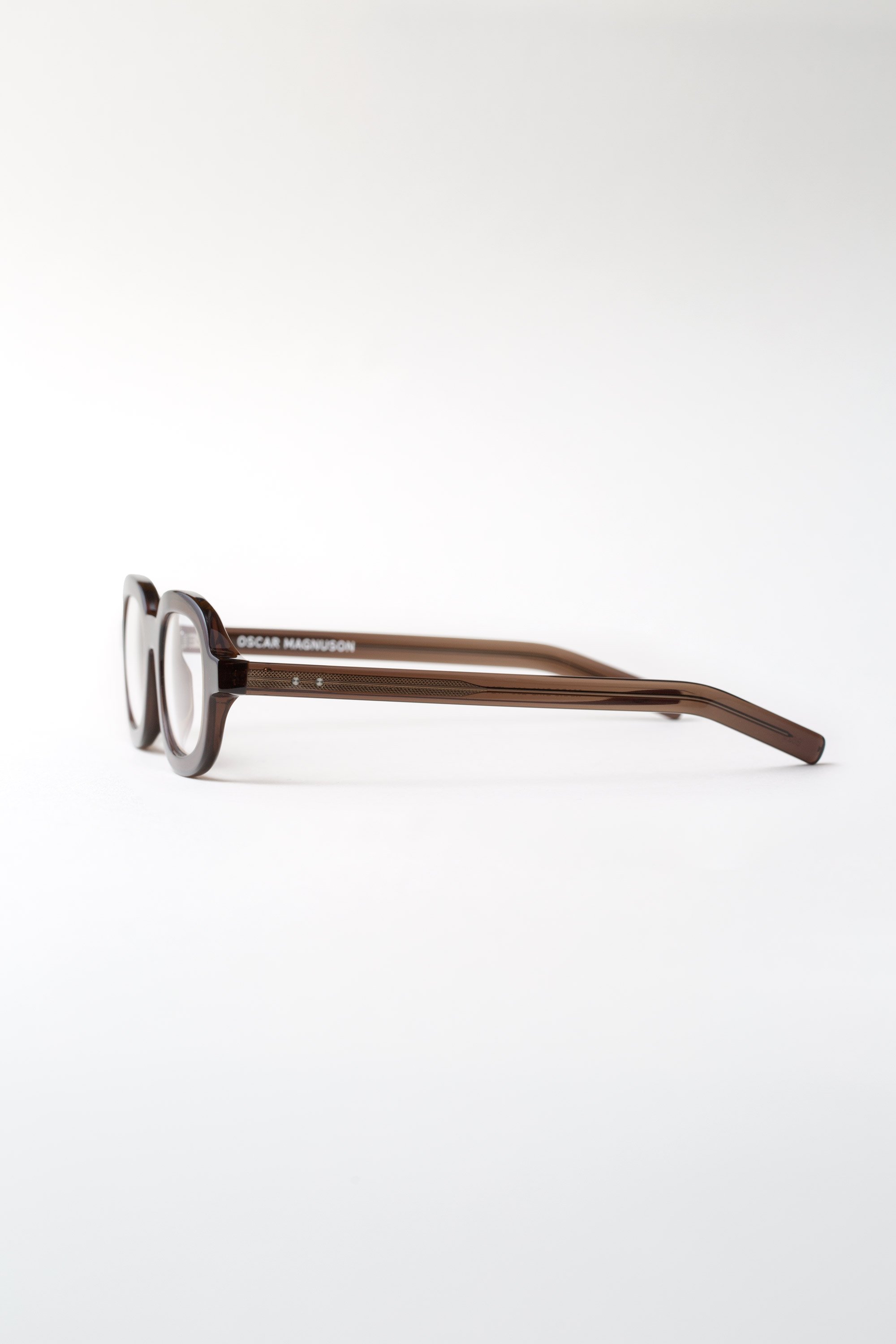 marc-om2-eyeglasses-200-dark-green-2-sideview.jpg