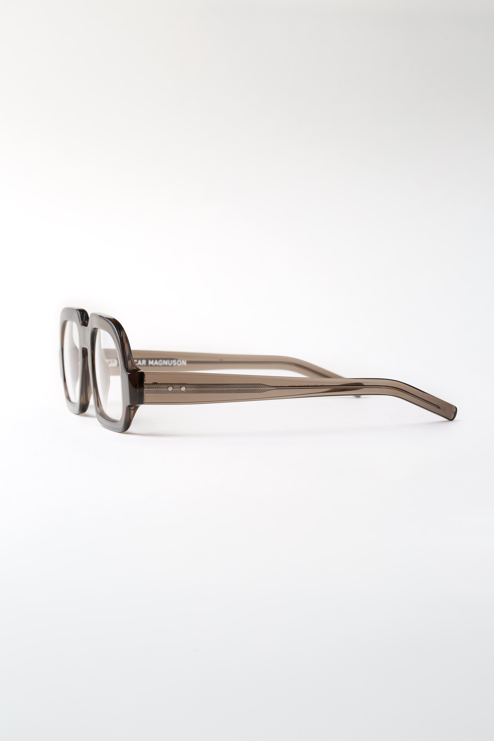 rudy-om6-eyeglasses-250-grey-2-sideview.jpg