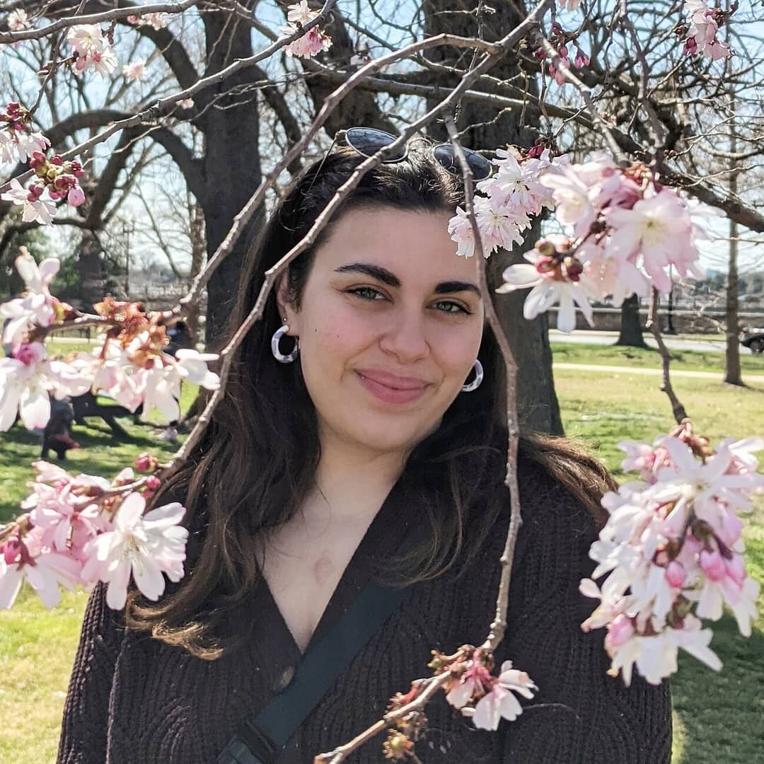 Cherry blossoms blooming, cow print earrings on!