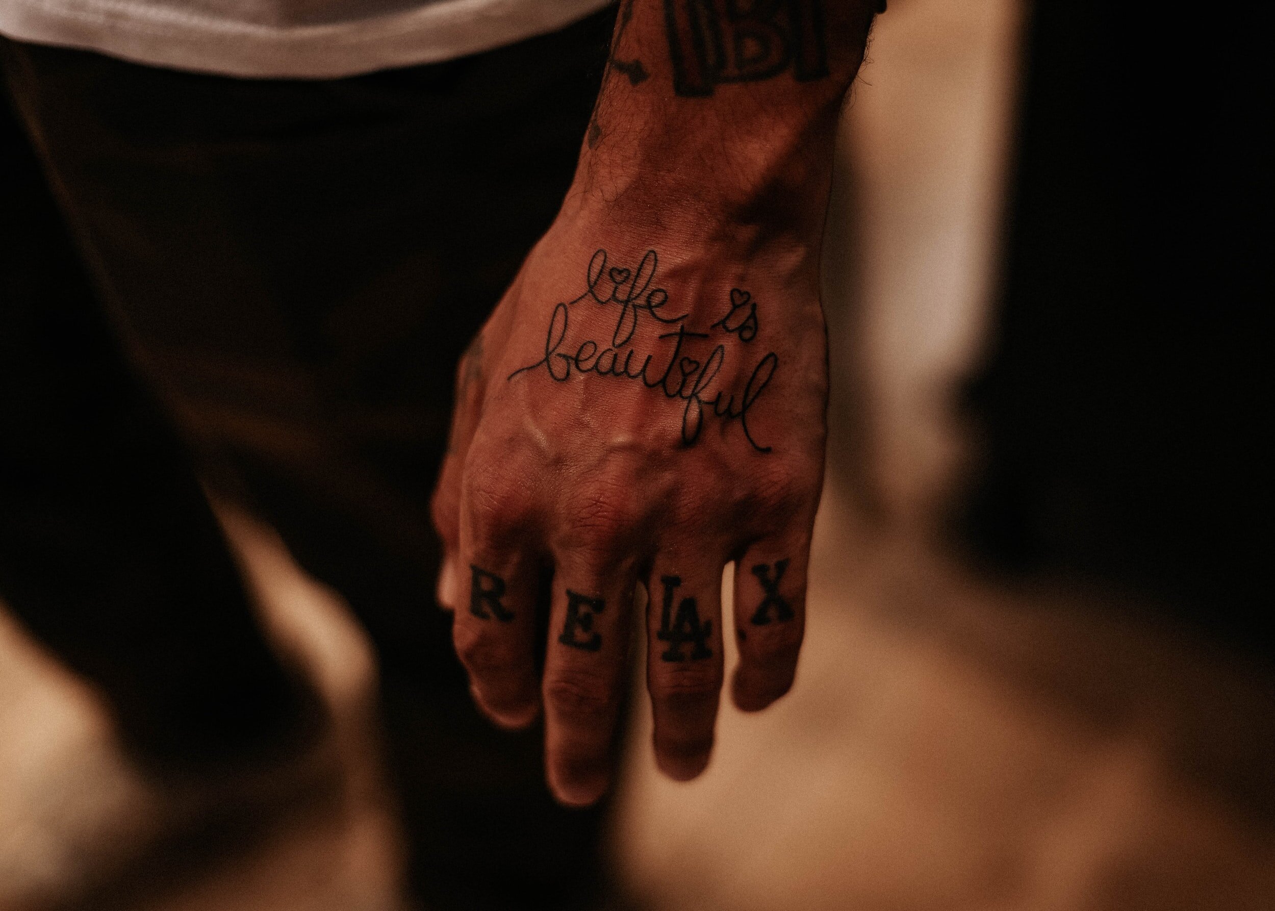 An attendee with a Life is Beautiful tattoo with the years they attended  during the 2021 Life is Beautiful Music Festival held in Downtown Las  Vegas Nevada on September 17 2021 Photo