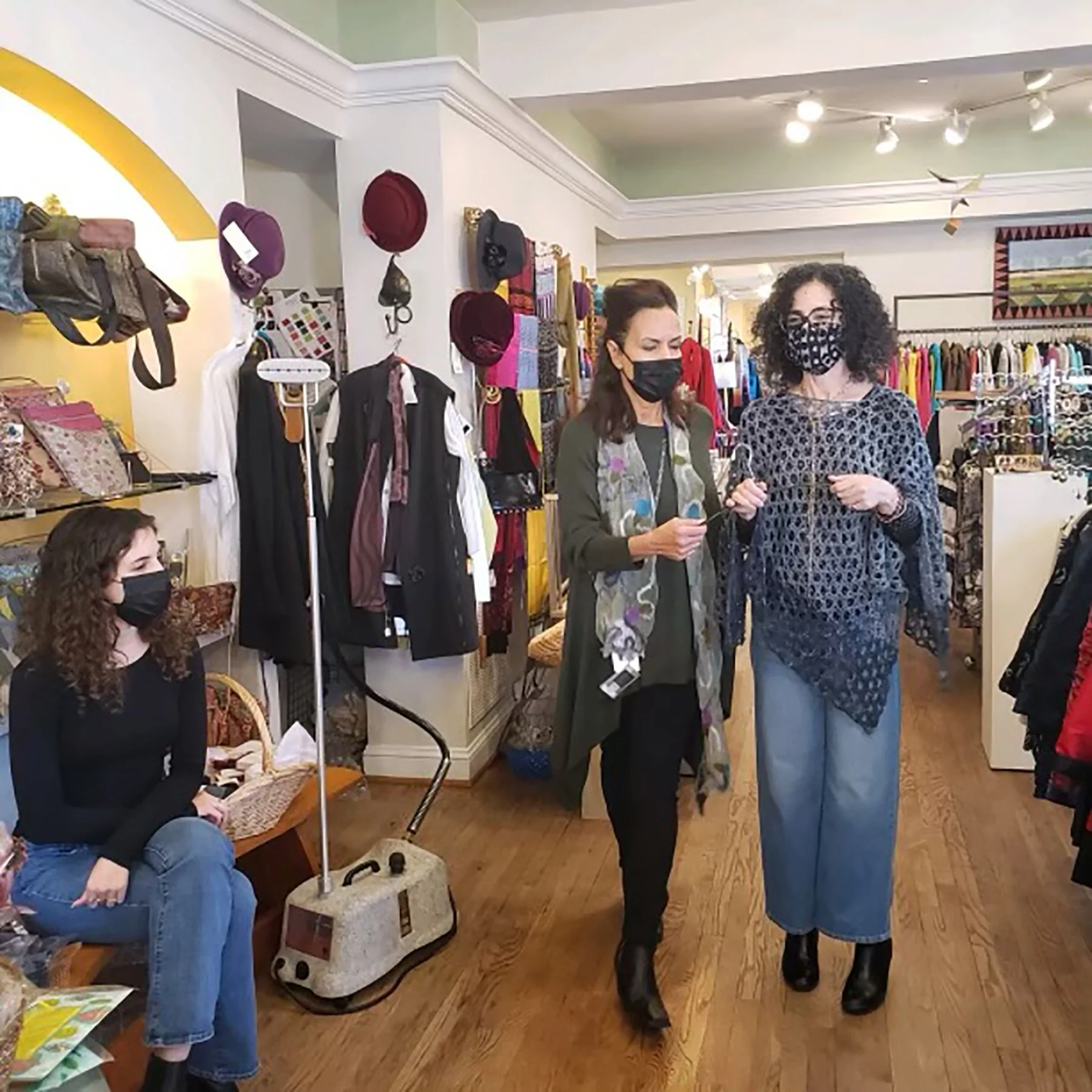 Kiki’s daughter, Koula, is sitting on the bench—she was a baby when I first met Kiki at a New York show. Pictured above: Koula, Jila and Kiki.