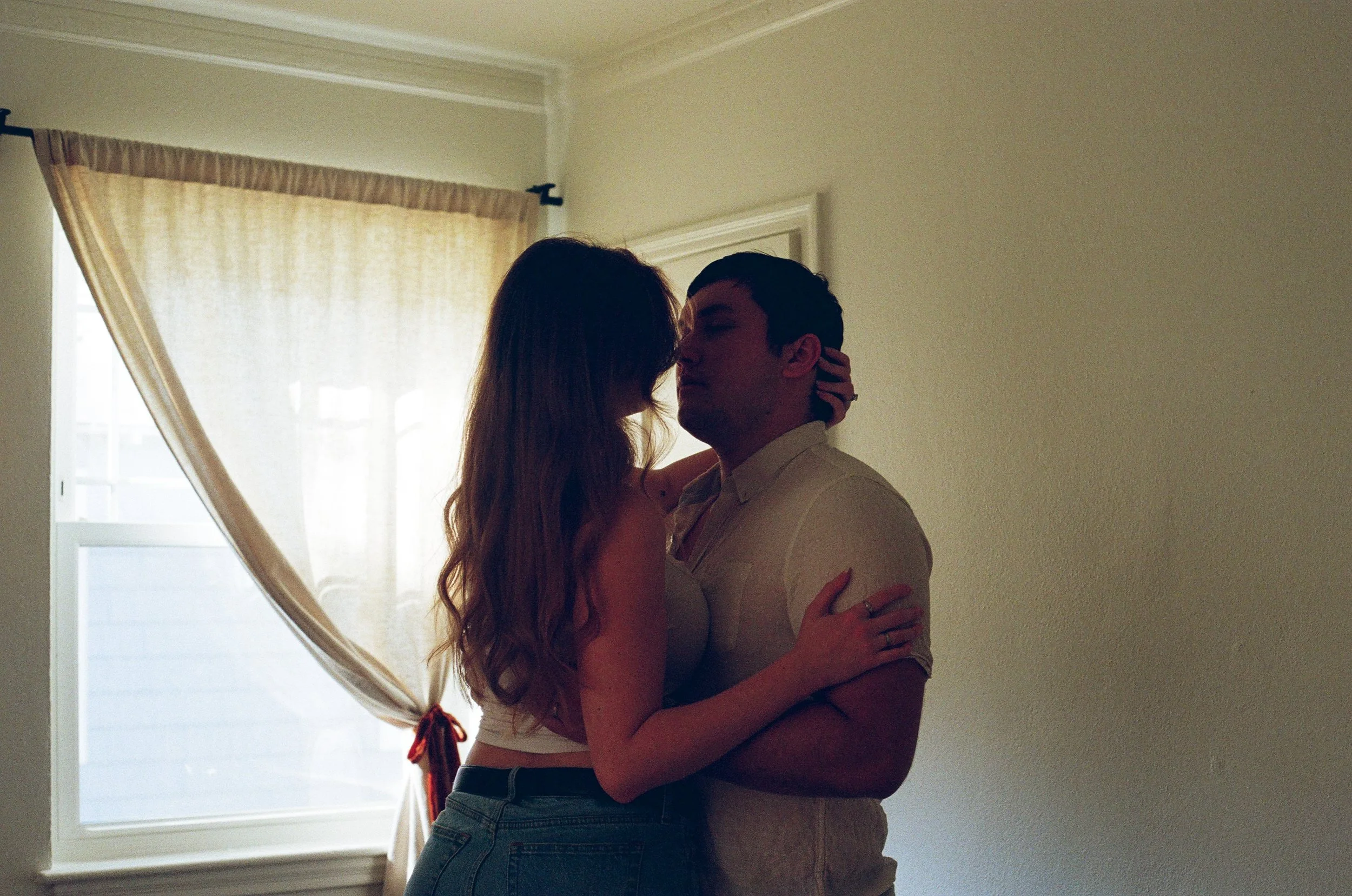 Intimate in-home couple session photographed on film.jpg
