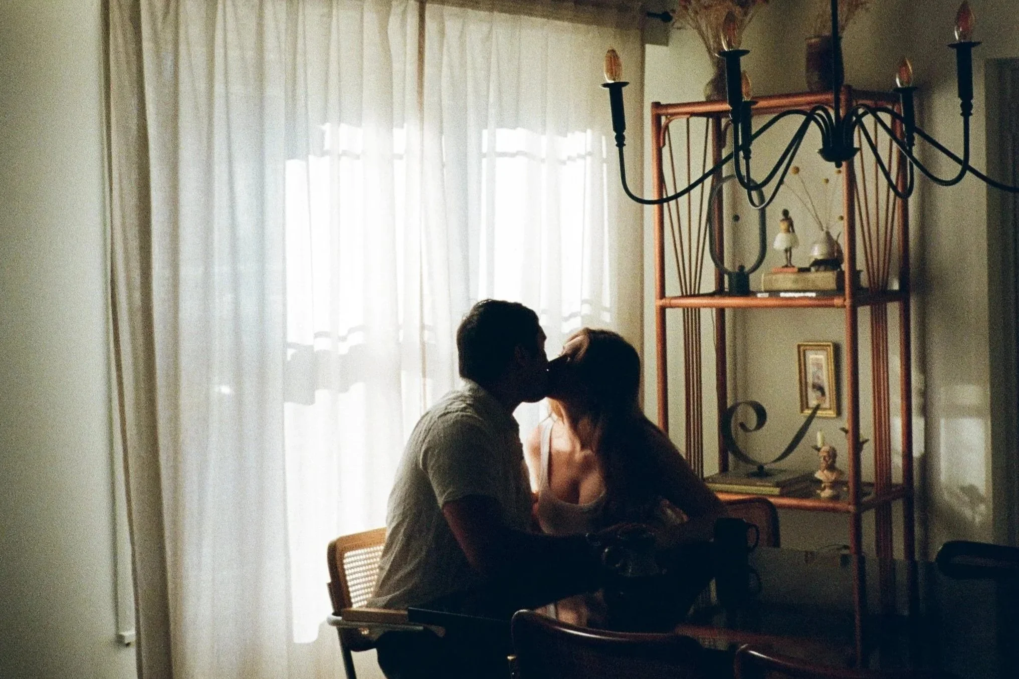 Cozy kitchen moment from anniversary film photo session in Jacksonville Florida