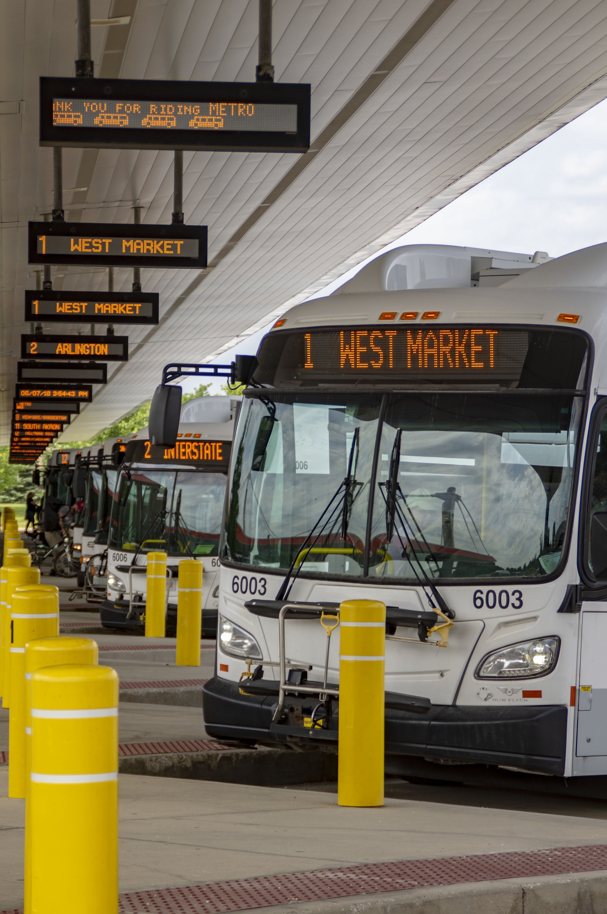 Buses at Robert K Pfaff Transit Center METRO.jpg