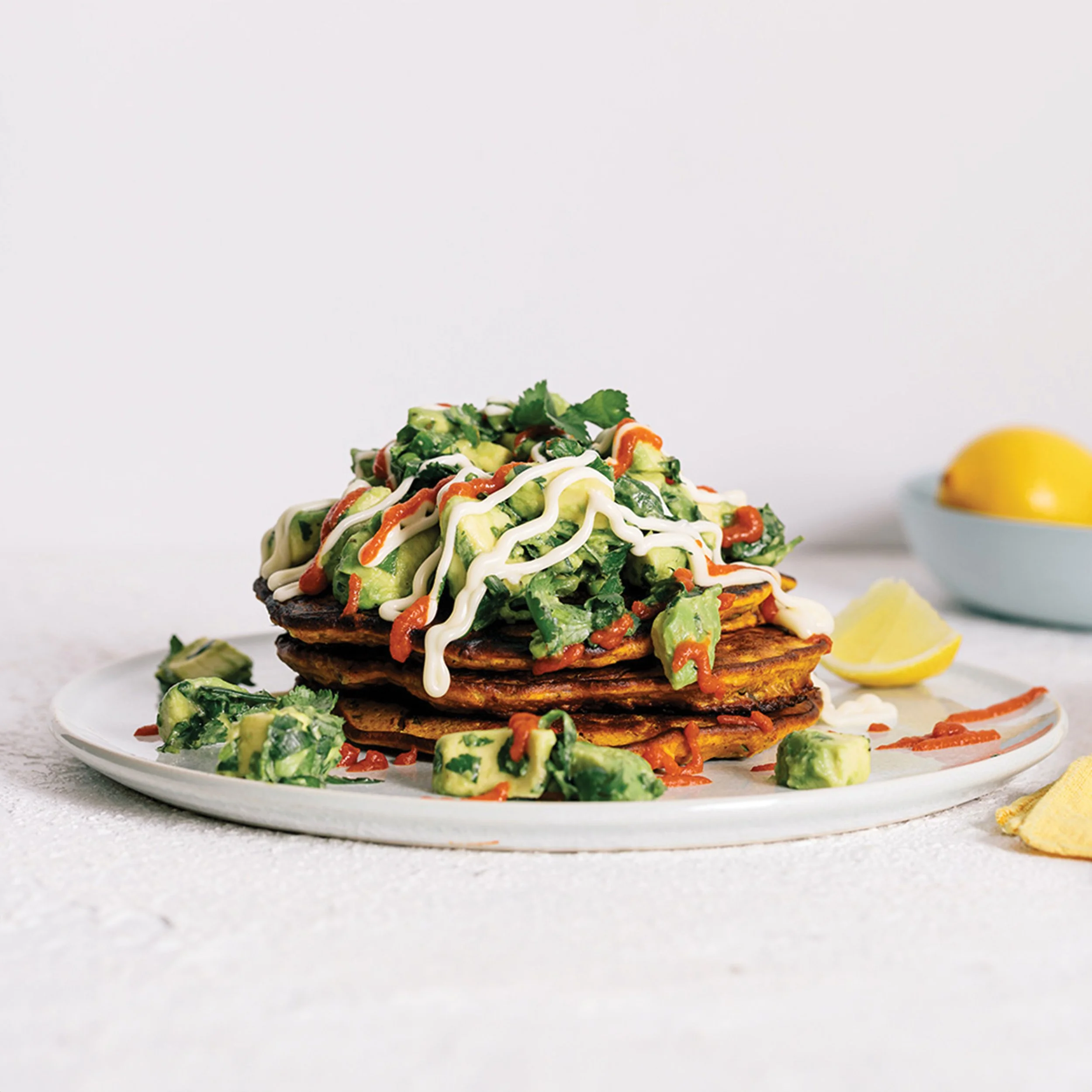 Kimchi pancakes with avocado, cashew aioli and tomato pesto
