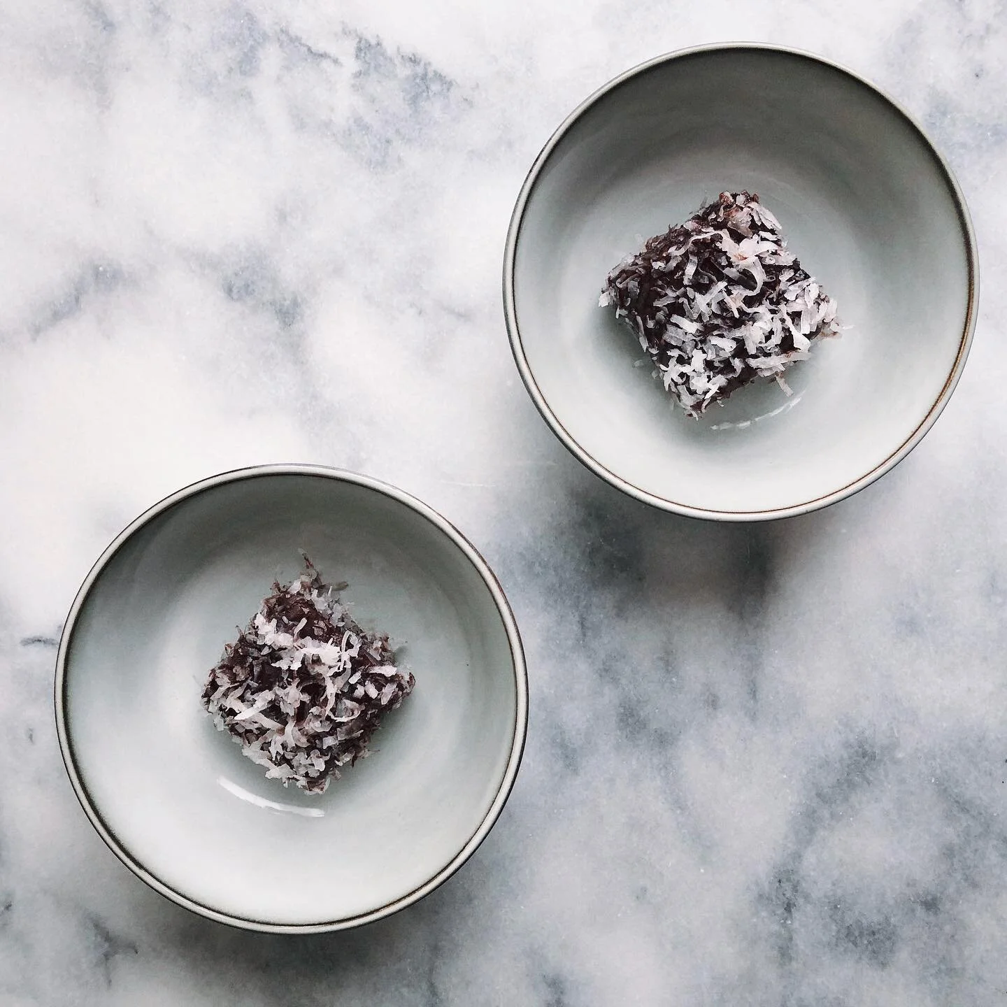 Another classic aussie snack &mdash; lamingtons! Can always be found at picnics, bbqs, office birthdays etc. 🤩
.
.
.
.
.
#lamington #coconut #vanillasponge #cakesofinstagram #cake #cakestagram