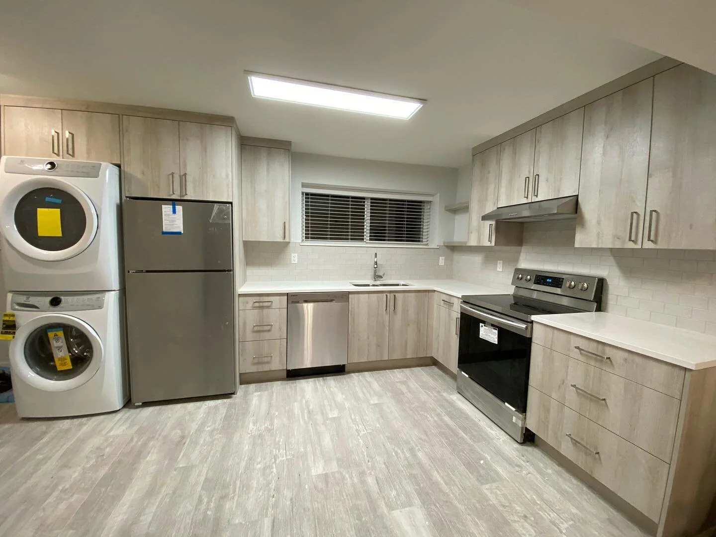 Old and tired &mdash;&gt; Clean and contemporary. #kitchen #renovation #basementsuite #fullgut