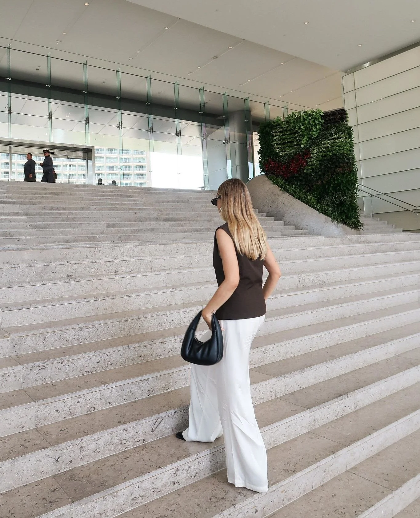 Rain or shine, the mission stays the same. Taking the steps toward greatness at Century Park.⁠
⁠
#PowerMove #CenturyCity #BusinessExcellence #RainyDayVibes #ArchitectureLovers