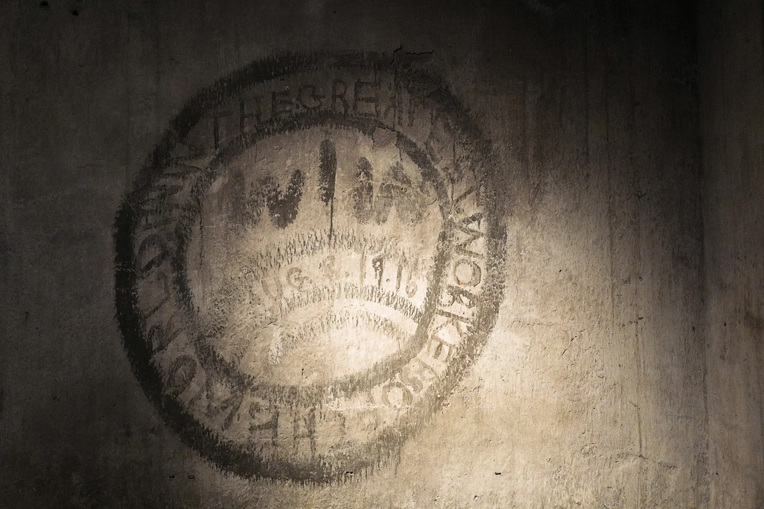 1919 Park City's Miners Strike—International Workers of the World emblem drawn with candle smoke on a Park City jail cell wall—now preserved at the Park City Museum (which houses the former jail). This artifact reflects the unique culture and dedicat