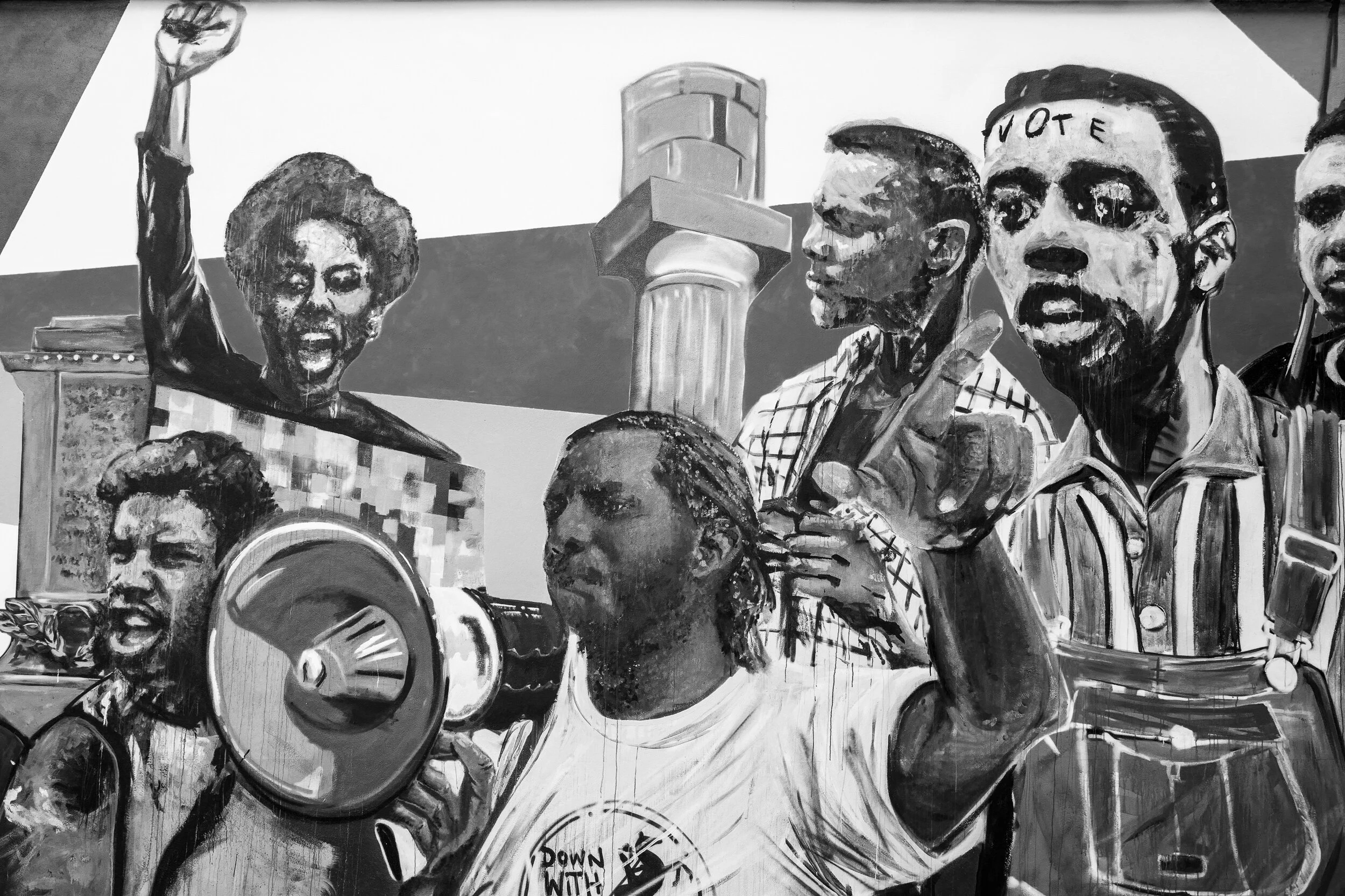 Section of a mural on Homer Plessy Way paying tribute to the Civil Rights struggle, featuring removed Lee monument and Michael "Quess" Moore of Take 'Em Down NOLA