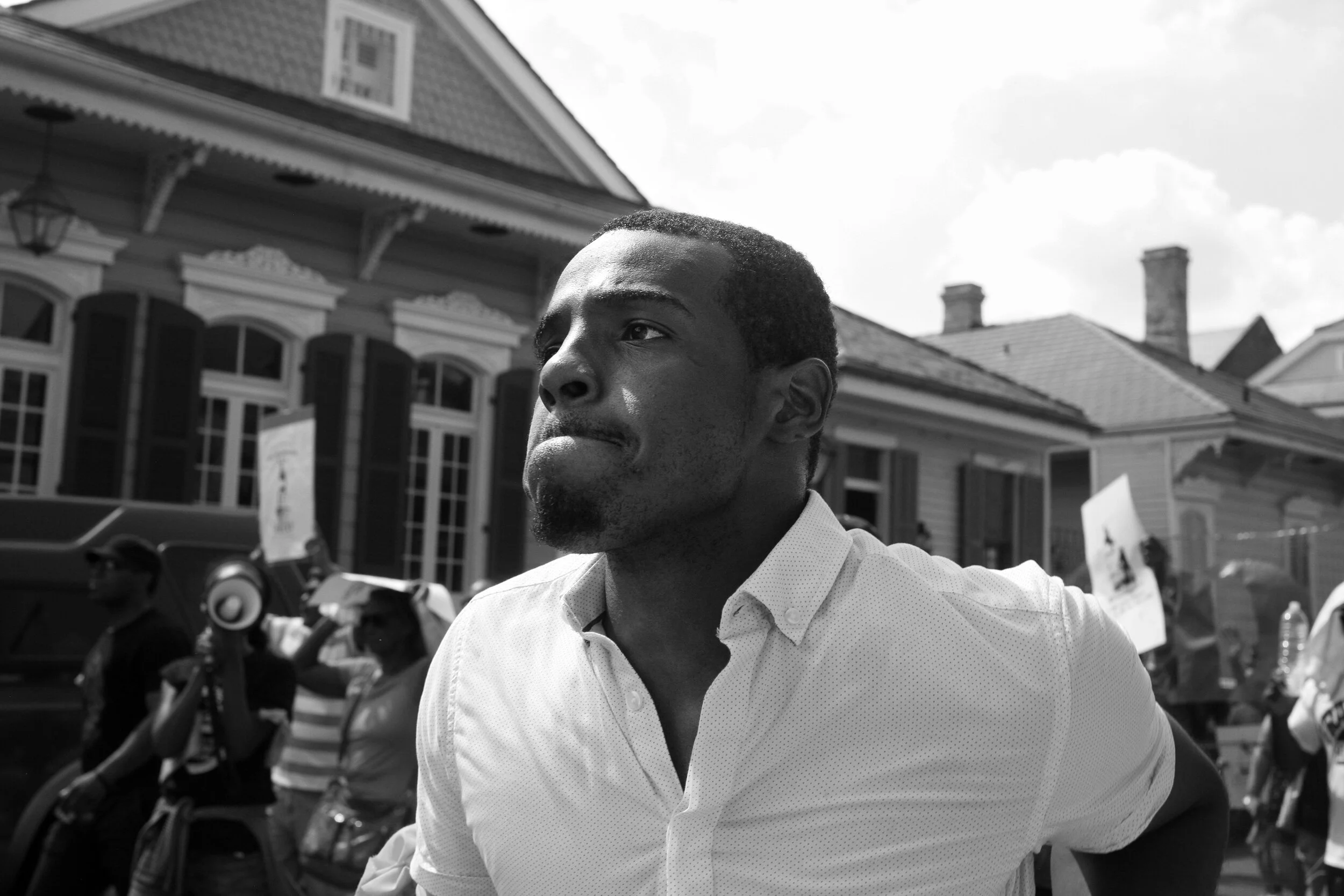 Man participating in march to remove monuments to white supremacy
