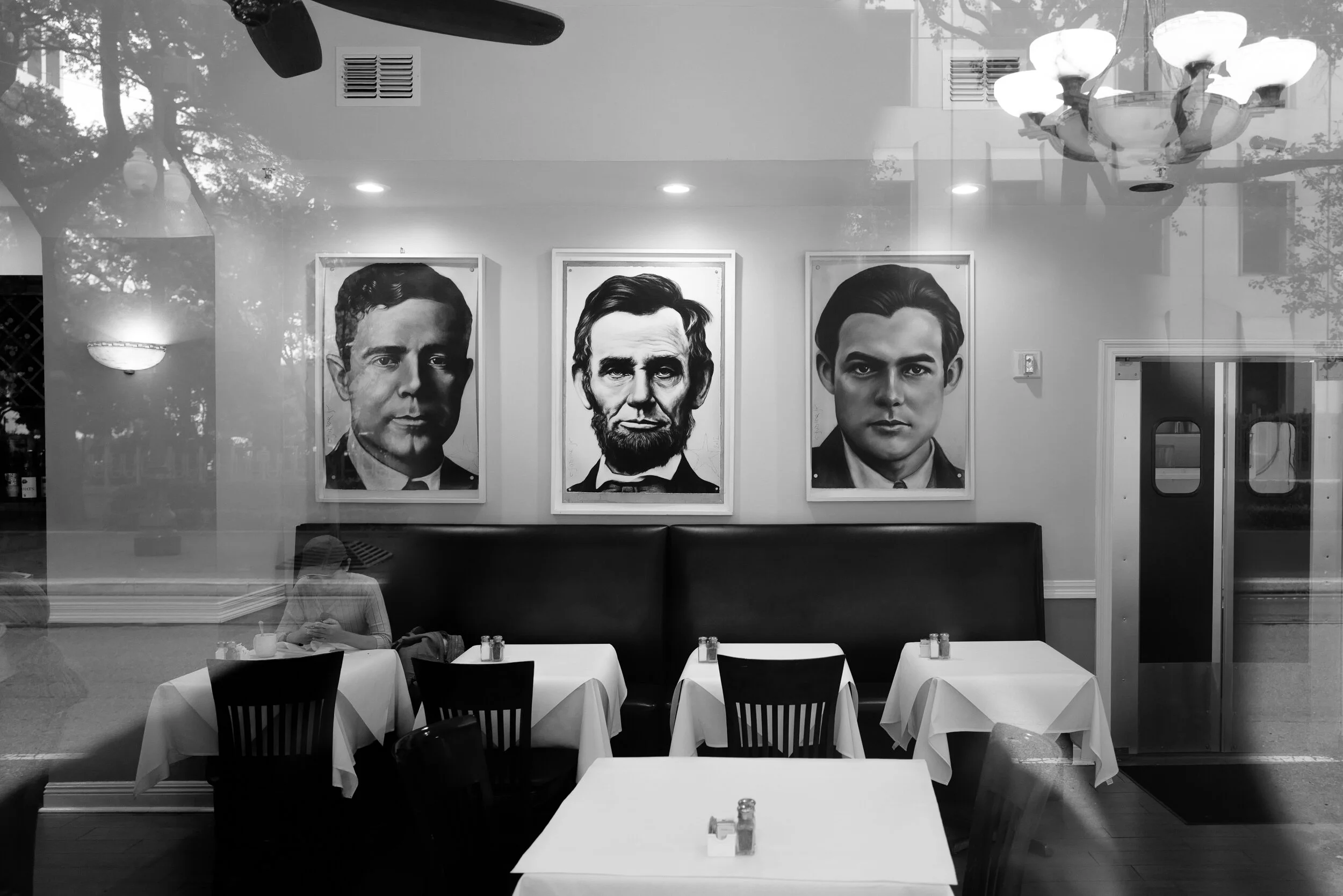 Portrait of Lincoln in Restaurant; though his visits to New Orleans as a young man were formative, unsurprisingly, there is sparse remembrance of the 16th president in the city [xix]
