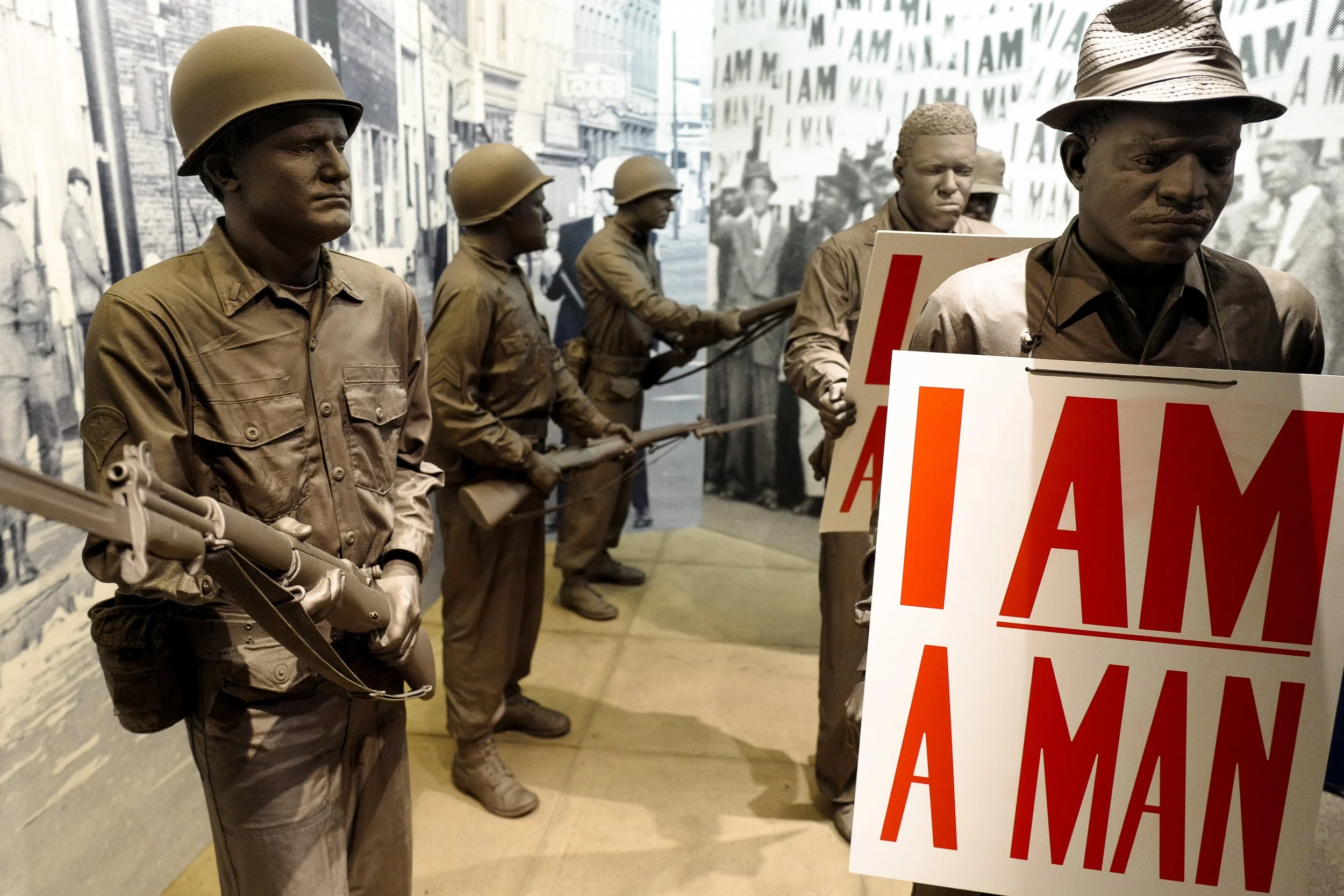 1968 Memphis Sanitation Strike— Exhibit at the National Civil Rights Museum depicting sanitation workers picketing before National Guard troops. Dr. Martin Luther King Jr. was assassinated during his visit to support these striking workers.(Memphis, 