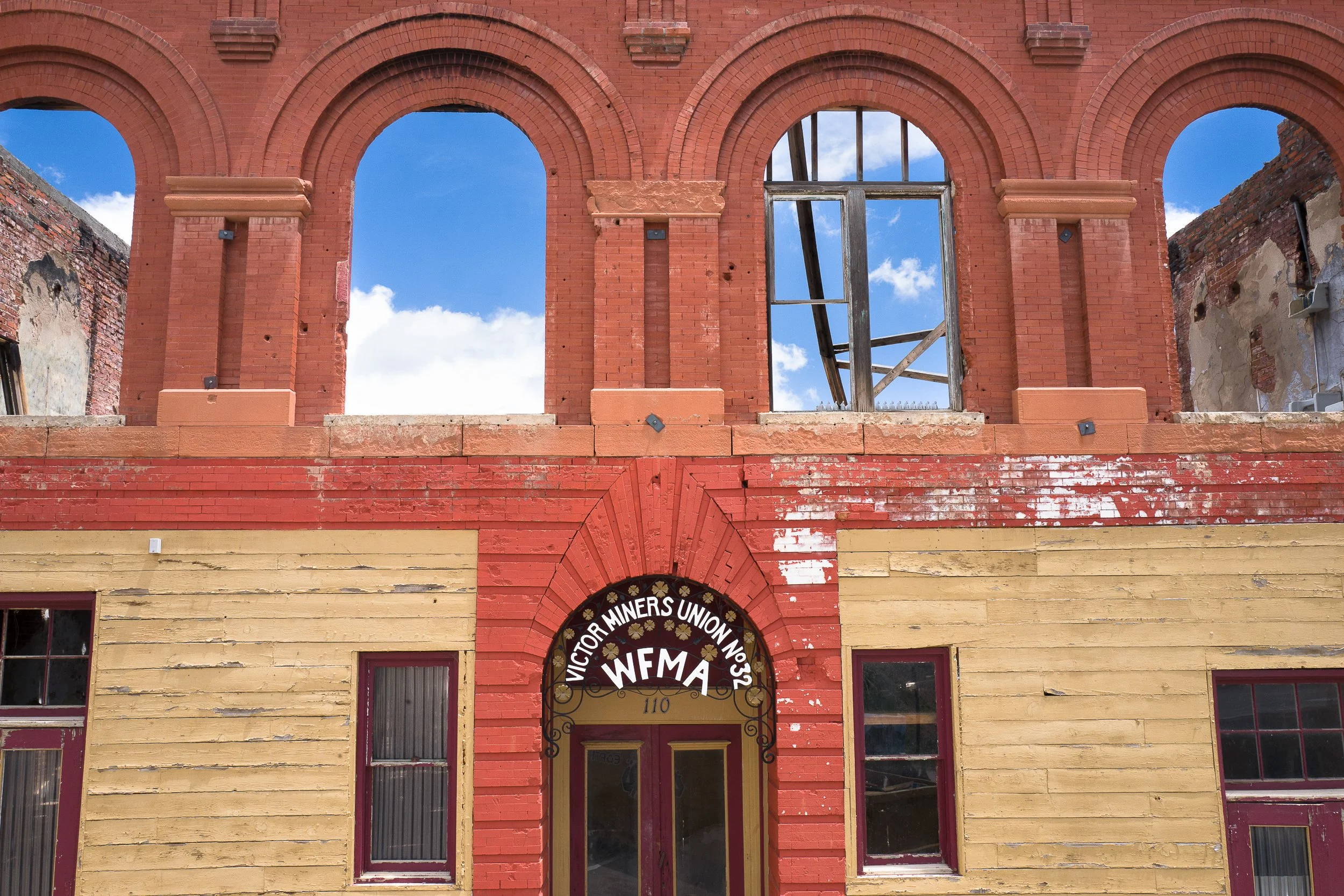 1903-1904 Colorado Labor Wars— Façade of the abandoned Western Federation of Miners Union Hall, still scarred by bullet holes from a 1904 attack by the mine operator-backed Citizens’ Alliance. The following mob rule would result in the mayor's resign