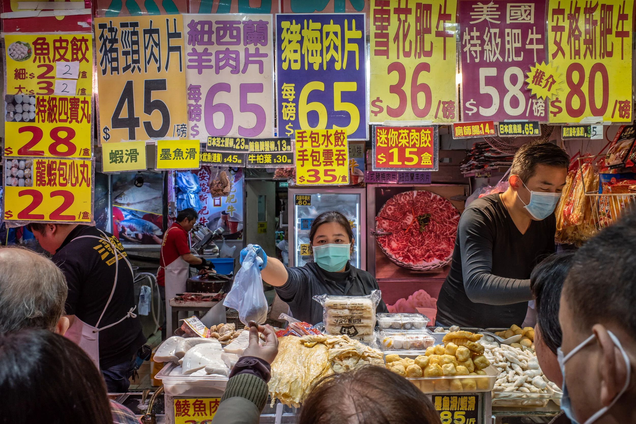 1580335394972-GettyImages-1197377917-people-in-protective-masks-at-meat-market-in-hong-kong.jpeg