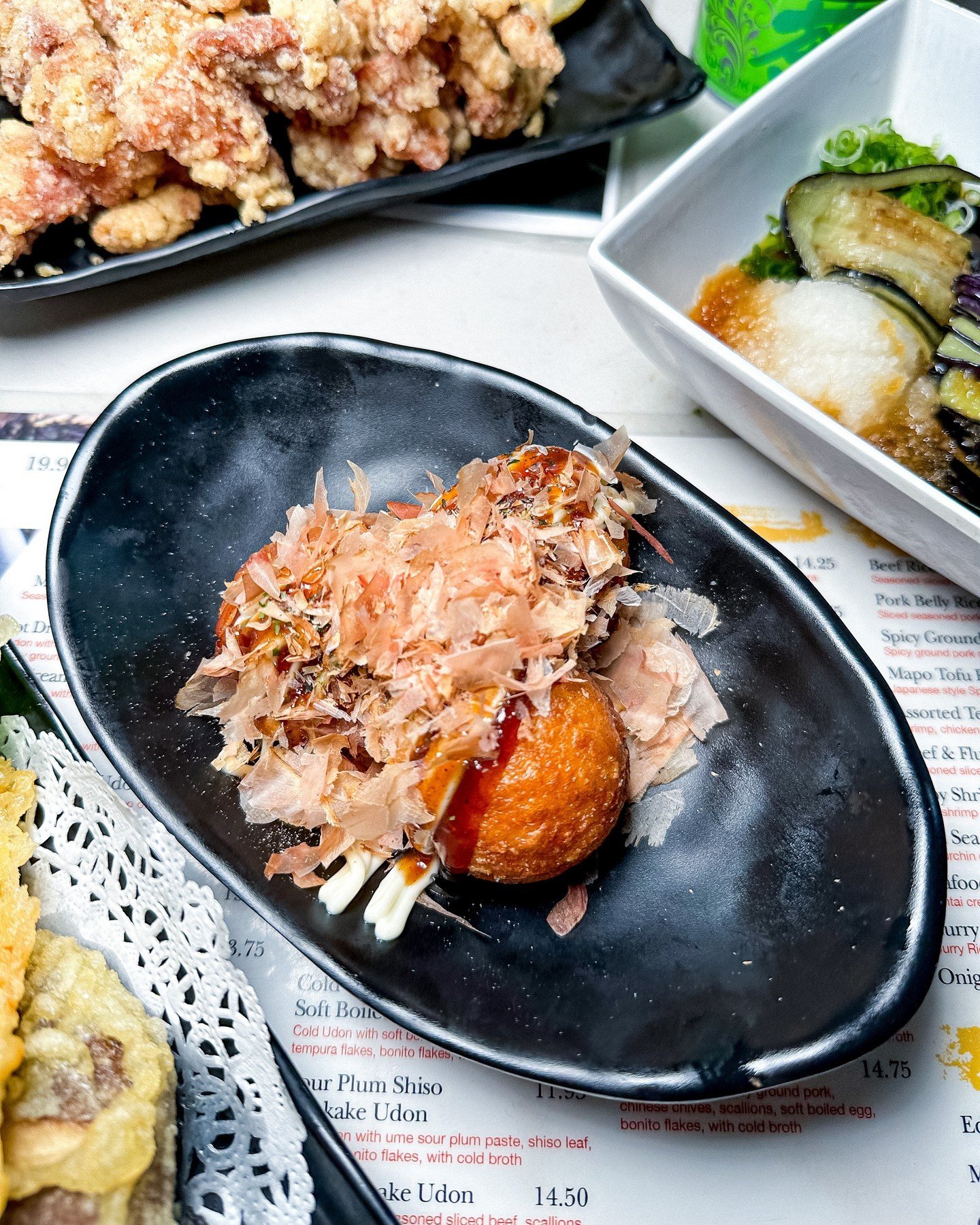 Get ready to take a flavor trip to Japan with these crispy, savory, and oh-so-addictive takoyaki balls! Visit us today! #LAFoodie 🐙🔥 

👇 Freshly homemade noodles 
◾️◽️◾️◽️◾️◽️◾️◽️◾️◽️
🍜 ᴍᴀʀᴜɢᴀᴍᴇ ᴍᴏɴᴢᴏ ʟᴀ
⏰ ᴍᴏɴ - ᴛʜᴜʀꜱ : 11:30 ᴀᴍ - 9:00 ᴘᴍ 
⏰ ꜰʀɪ 
