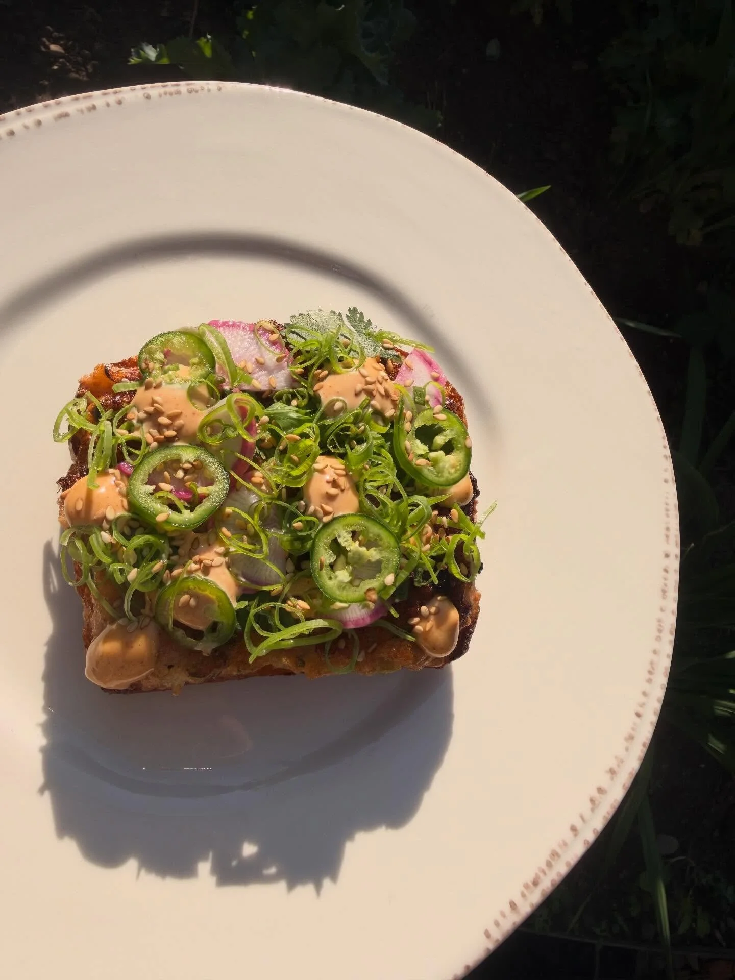 Our Shrimp Toast deserves a hard post!!! Look at this thang! 🍤🍞 freakin yum! Vietnamese style shrimp toast on a gorgeous milk bread, gochujang aioli, Serrano peppers, scallions, cilantro, sesame, radishes from our garden! 🫜 WoW!!! 

.
.
.
.
.
.
. 