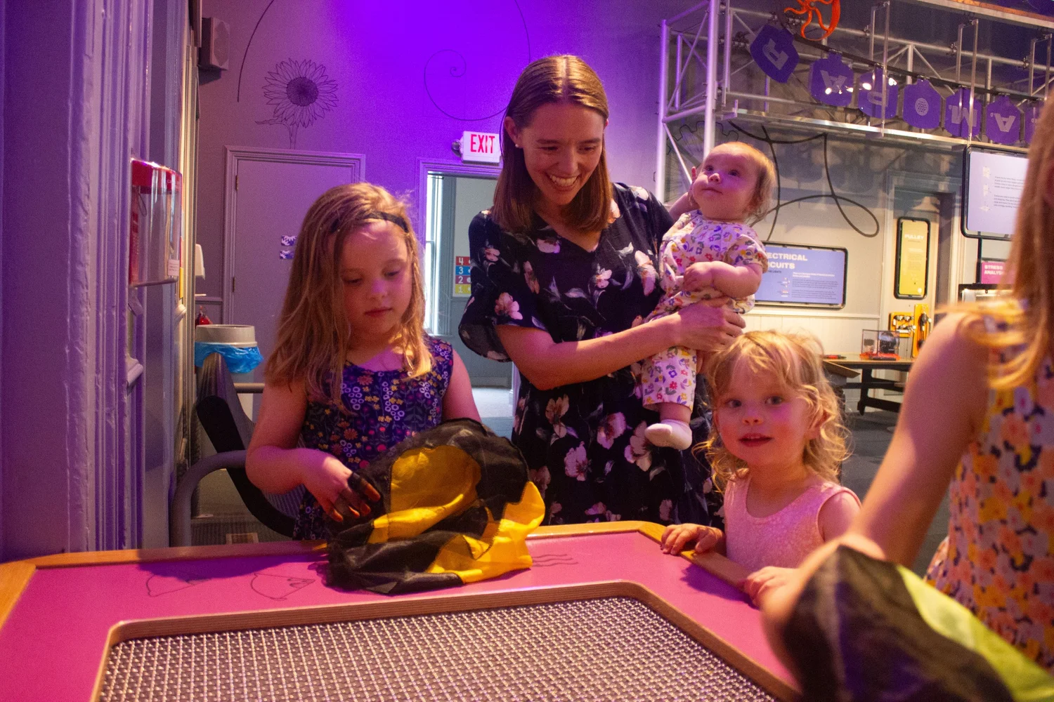 Family enjoying hands-on discovery together