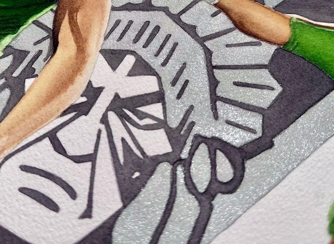 An extreme close-up of the Venice Indians mascot logo, highlighting the metallic silver pigment used to bring the iconic emblem to life alongside the fine ink linework.