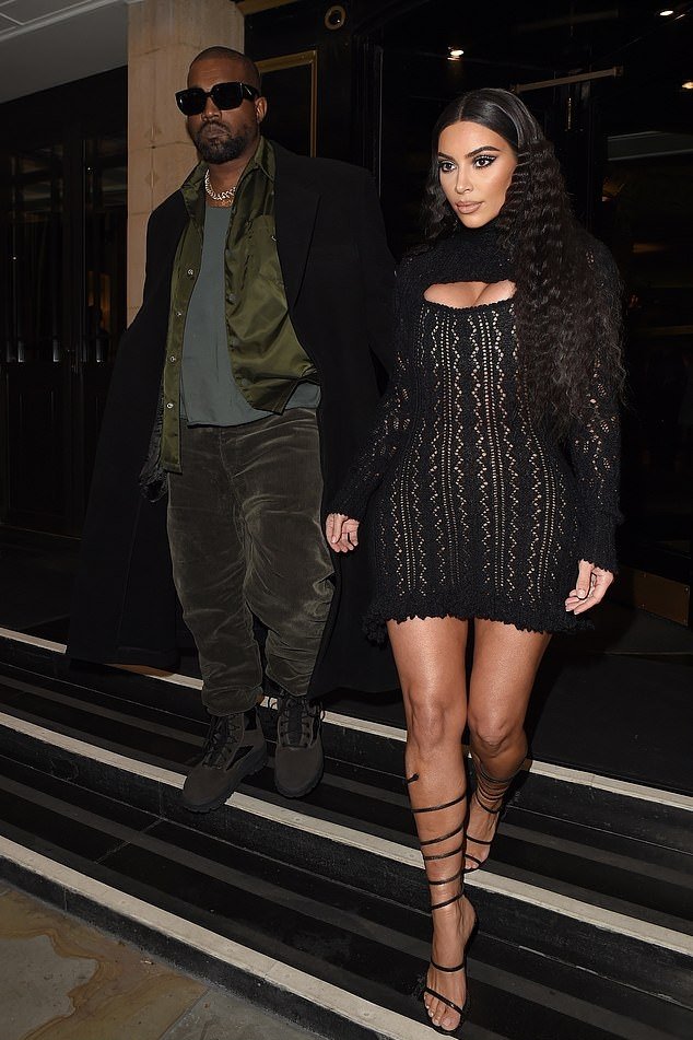 Kim+Kardashian-black+dress-crochet+detailing+dress-Vivienne+Westwood+dress-ruffled+hem-extra+long+sleeves-turtleneck-formfitting-showcase-cut+out-lace+detailing-mini-revealing-ample+cleavage-vintage_2_20115_166878.jpg