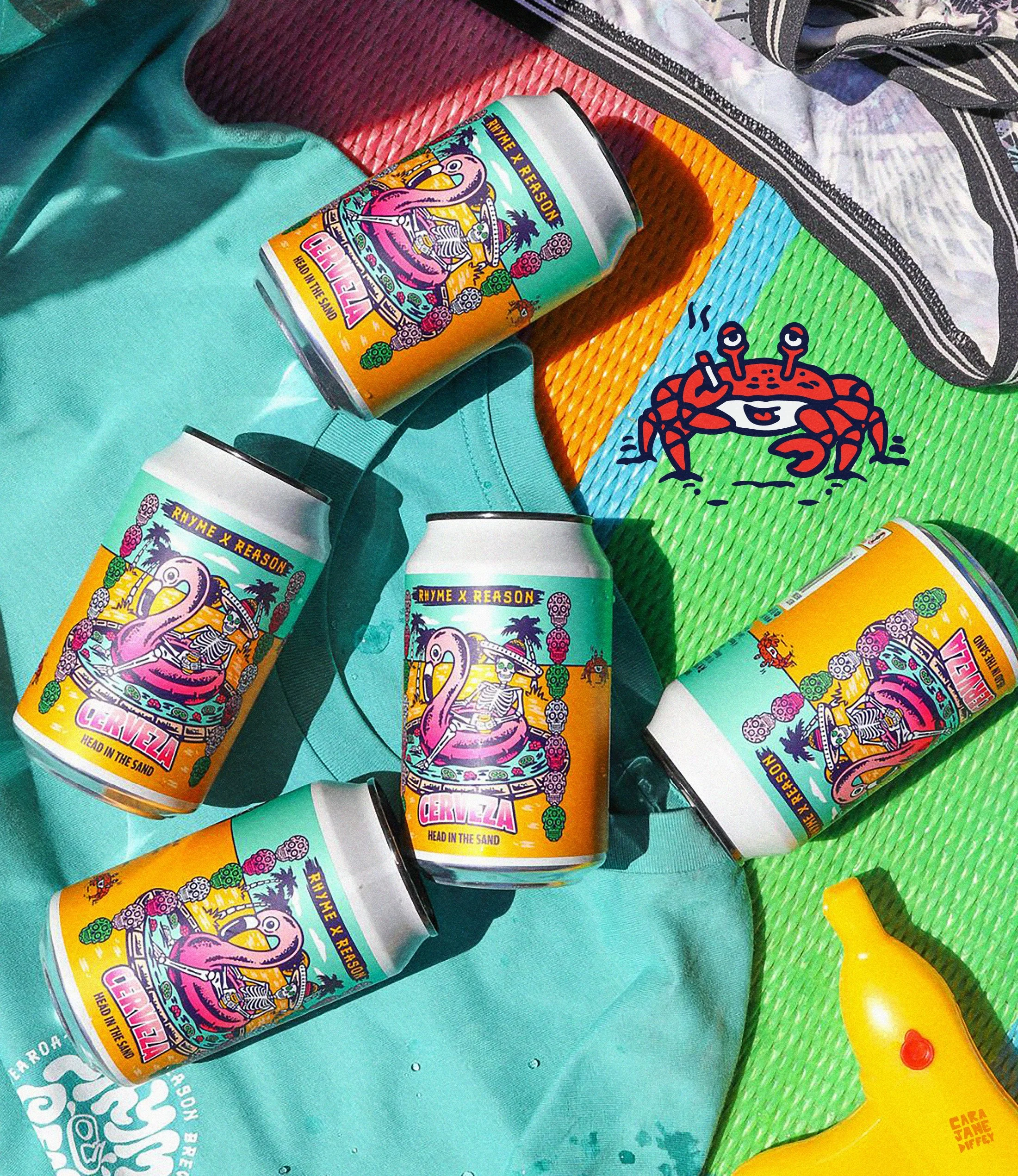 Four cans of Rhyme x Reason beer with colorful labels featuring a pink flamingo, palm trees, and vibrant graphics, placed on a multicolored textured surface with a yellow plastic toy gun nearby.
