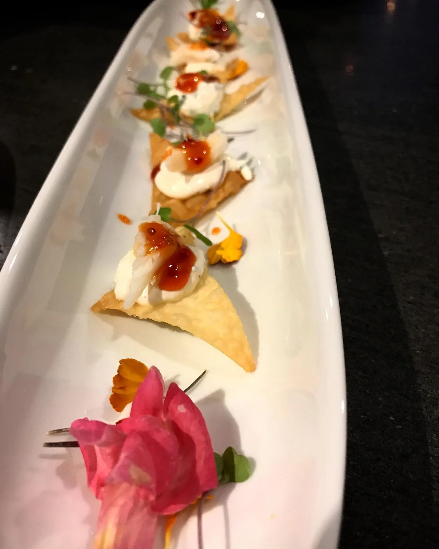 Couple of fun appies from dinner parties this weekend! 
🦀 Crab Rangoon, Meyer lemon, chive, passion fruit chili sauce 
🥕 Spring roll- carrot harissa hummus, avocado, pea shoots, radishes 
I love what I do, 24/7