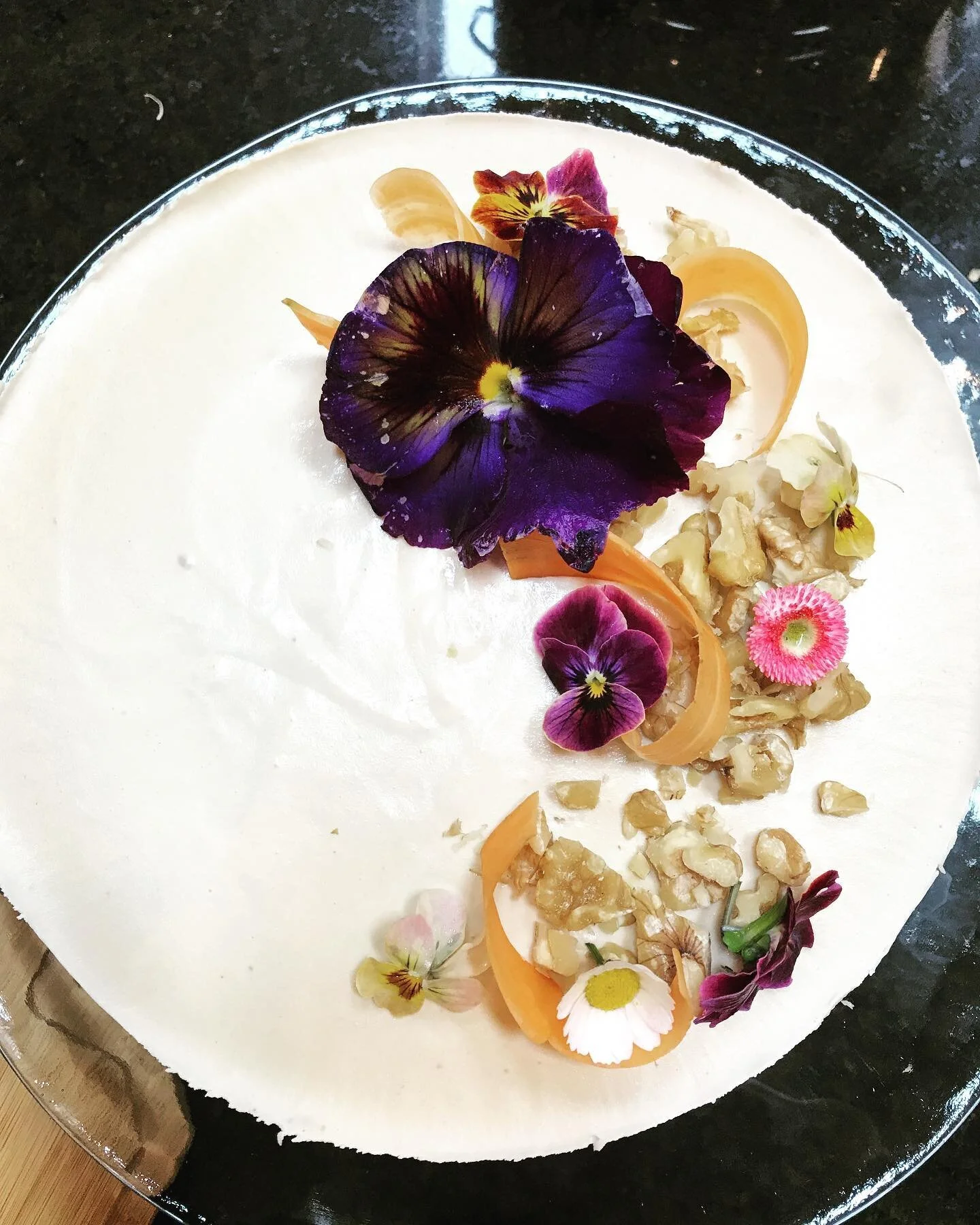 🥕CARROT CAKE 🥕
I wish I had taken some other photos of this cake from the side, but here she is in all her glory.
Plant based, raw, gluten and sugar free. It was my first time making it and I would do it over and over again. 
I added currents in