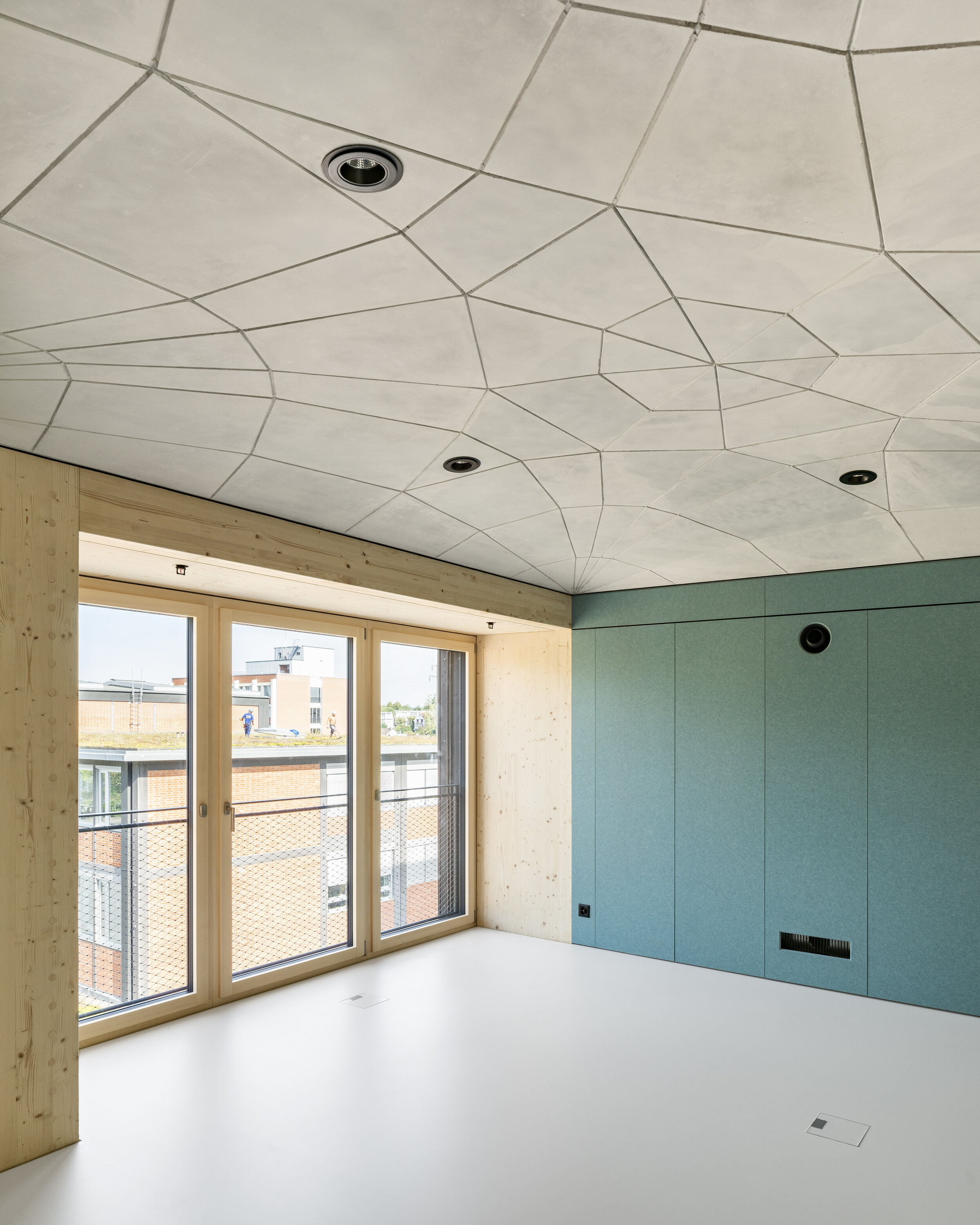 The office room on the west side with a view of the lightweight floor construction from below. Photo: Roman Keller (Copy)